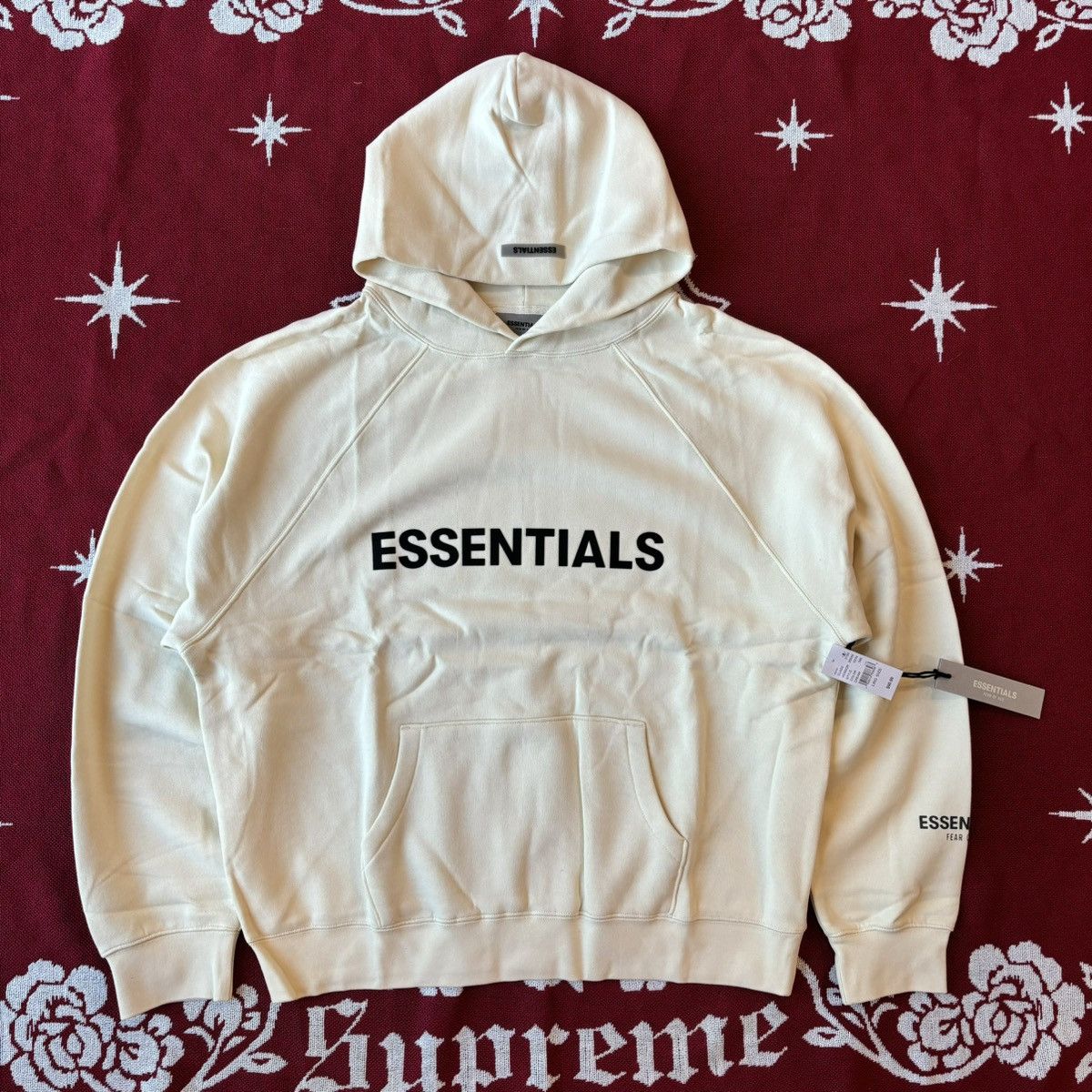 image of Essentials Pullover Hoodie Applique Logo Size L in Butter Cream, Men's