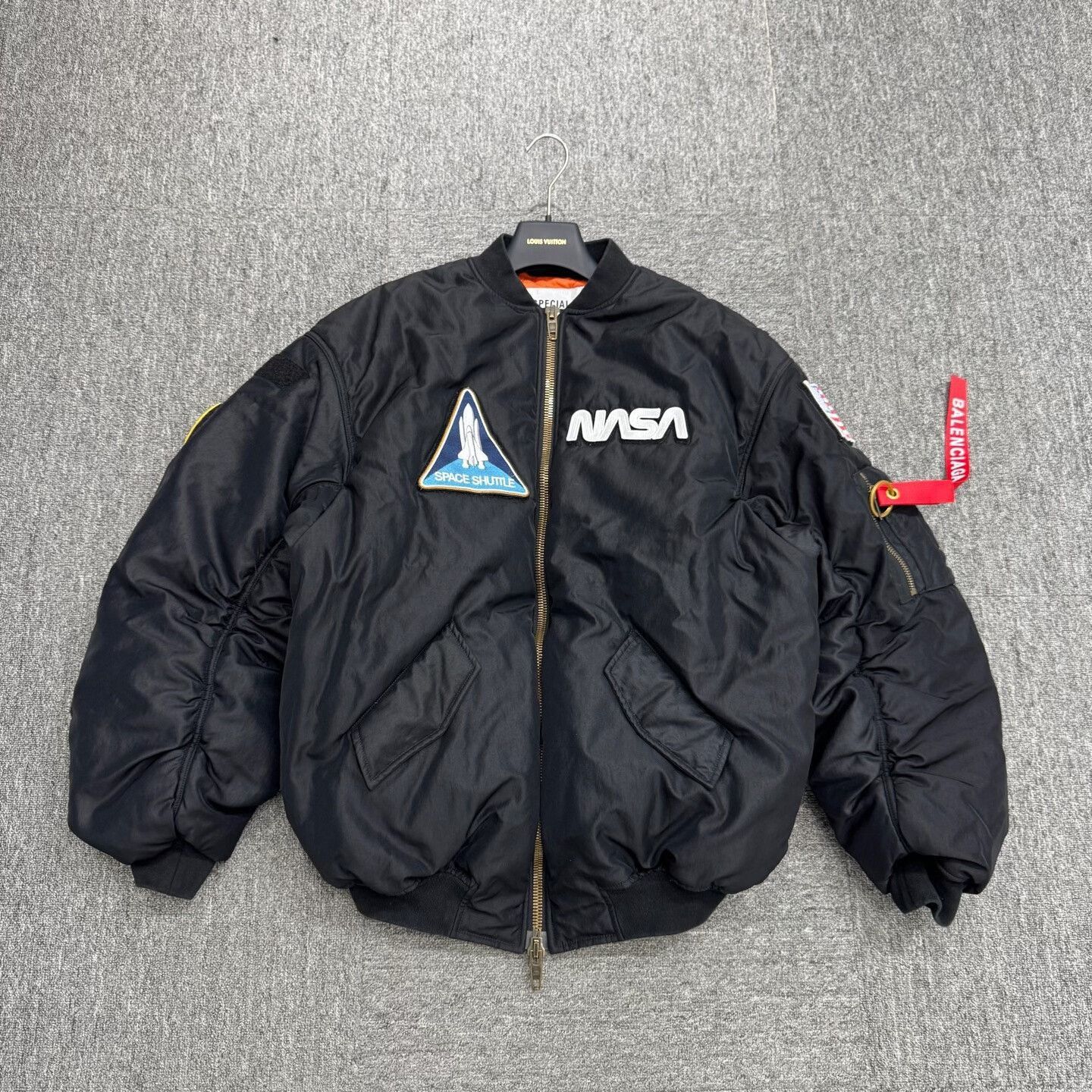 balenciaga nasa cotton puffer jacket.