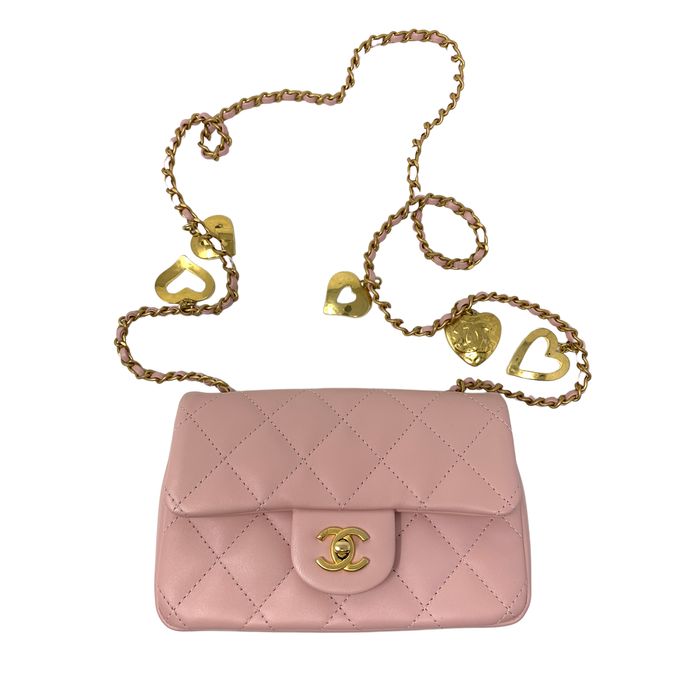 pink chanel bag with gold chain necklace