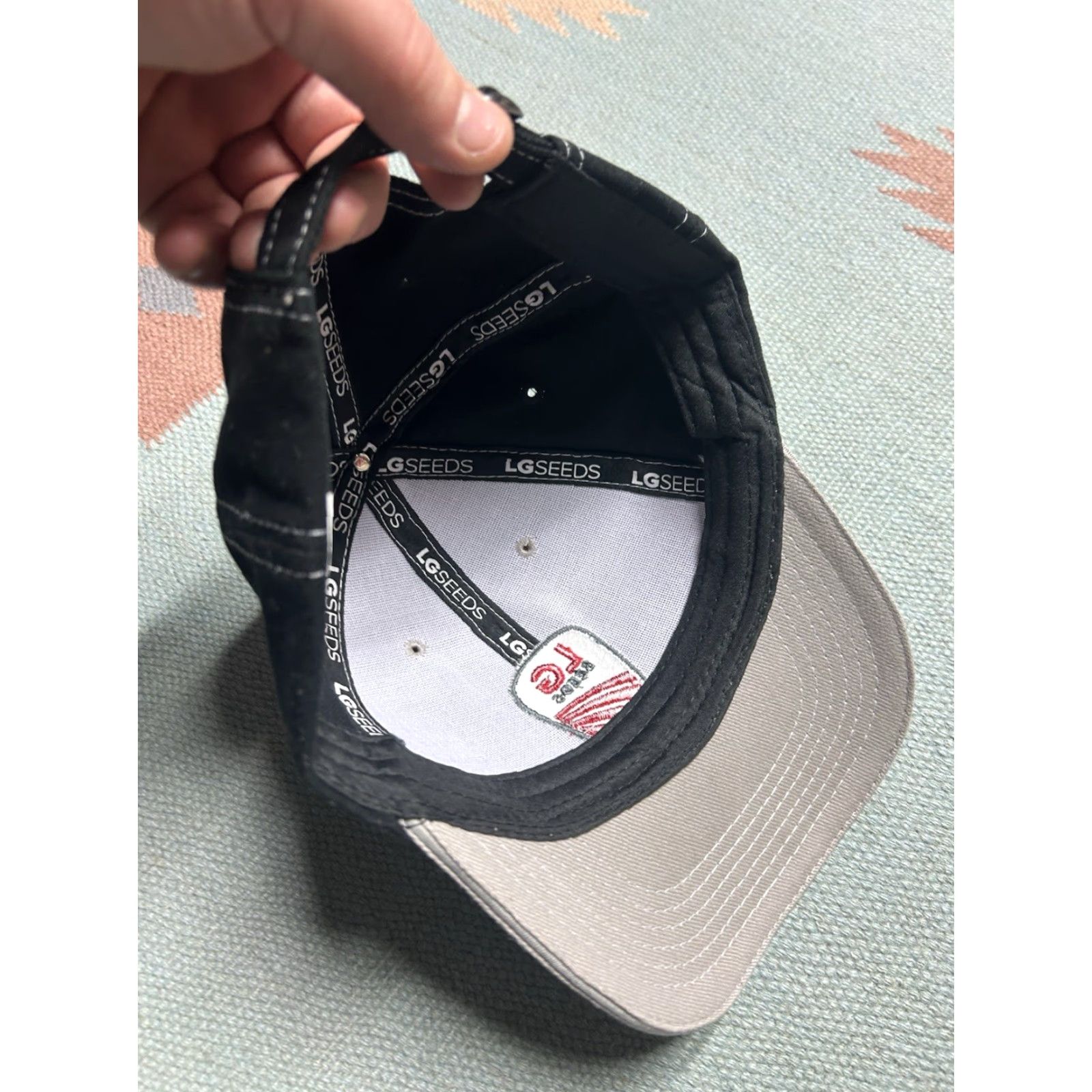 Vintage **ADJUSTABLE EMBRODIRY BLACK LG SEEDS STRAPBACK HAT CAP** User: **ADJUSTABLE EMBROIDERED LG SEEDS BLACK STRAPBACK HAT CAP** Size ONE SIZE - 6 Thumbnail