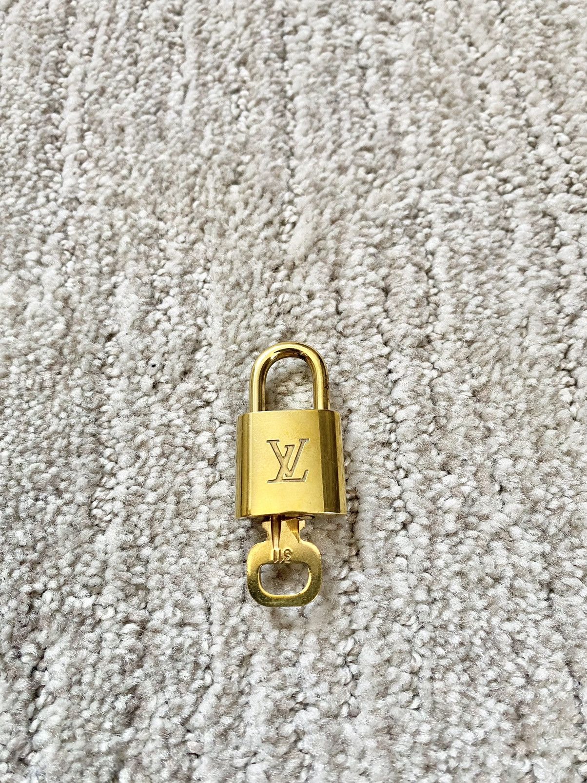 SOLD Authentic LV Lock and Key Set #311  Lock and key, Louis vuitton  accessories, Authentic louis vuitton