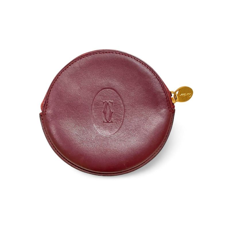 image of Vintage Cartier Genuine Wine Leather Coin Case With Gold Tone Logo Pull. Must De Cartier. Unisex. 0