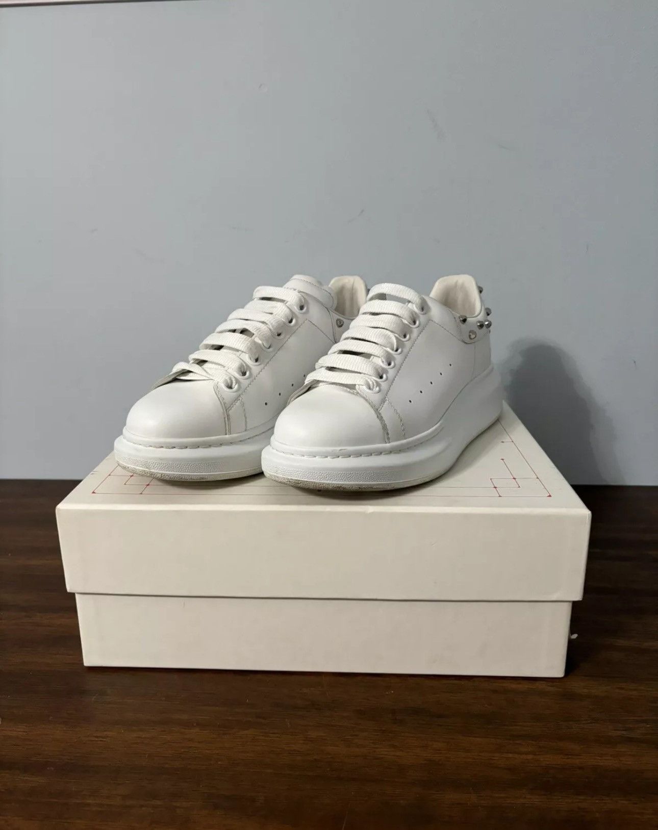 Alexander mcqueen studded trainers shop