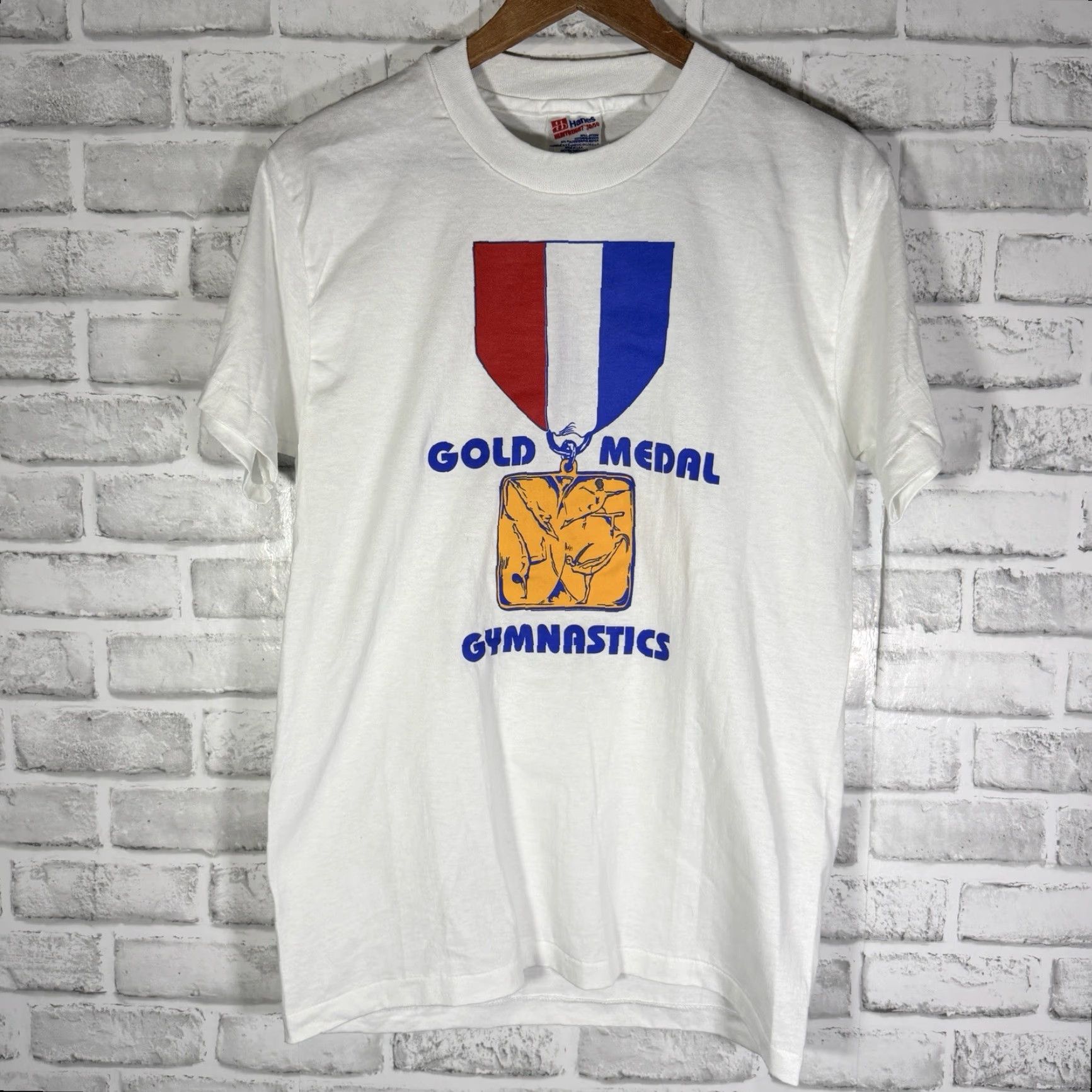 Hanes VINTAGE Hanes Gymnastics Gold Medal Graphic Tee Mens M USA White Stitch USA 1990s? (no extra) Size US M / EU 48-50 / 2 - 2 Thumbnail