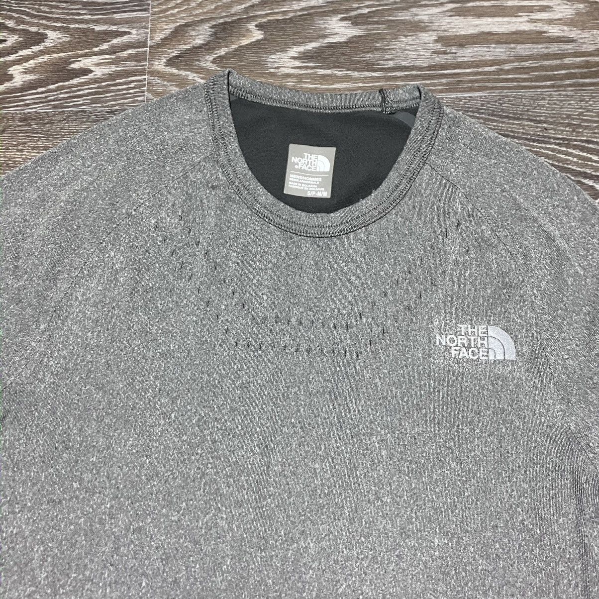 The North Face THE NORTH FACE Flight Series Reflective Logo L/S Base Layer Size US M / EU 48-50 / 2 - 3 Thumbnail