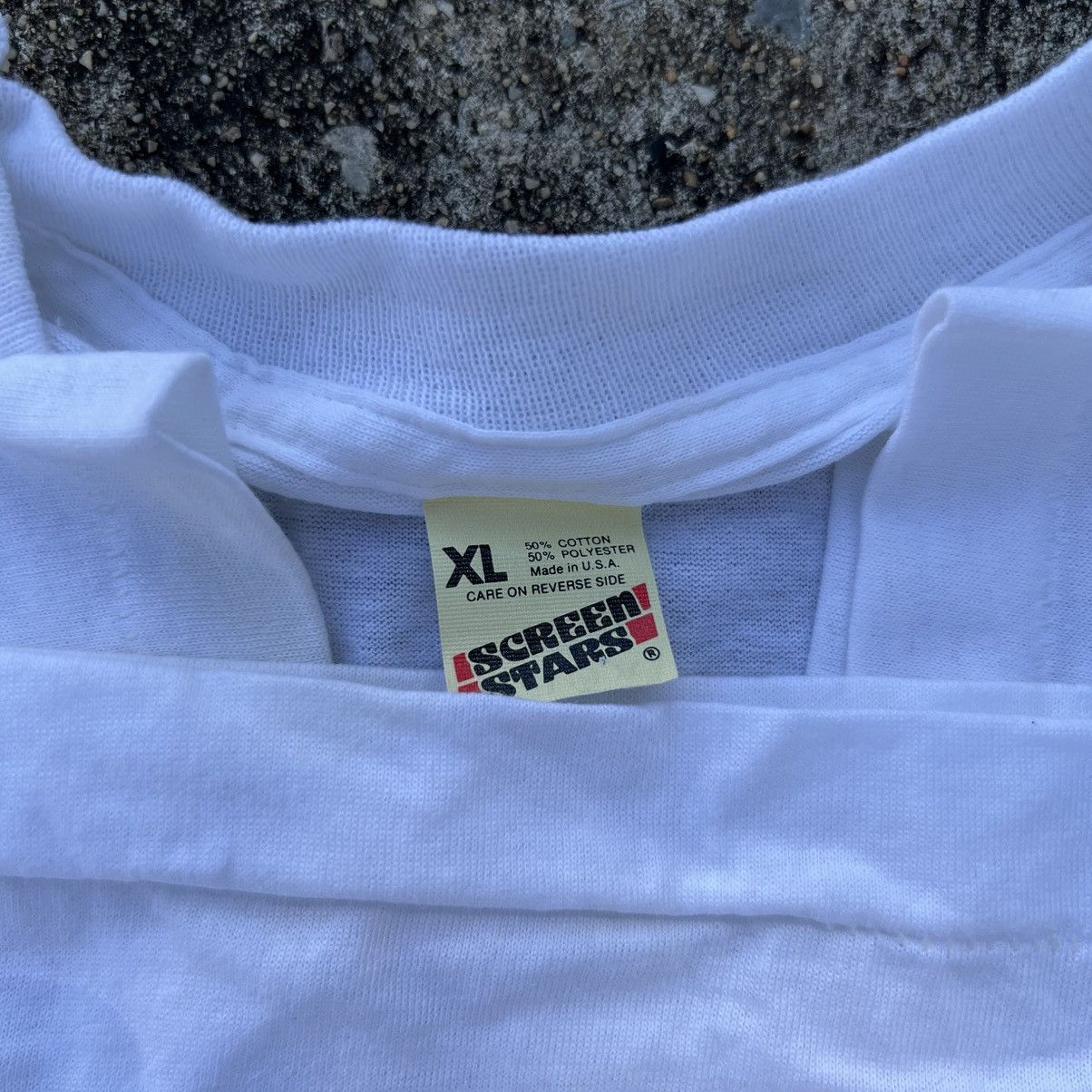 Vintage 90’s NewPort MGA overall print on 80s tag tee (DeadStock) Size US XL / EU 56 / 4 - 6 Thumbnail