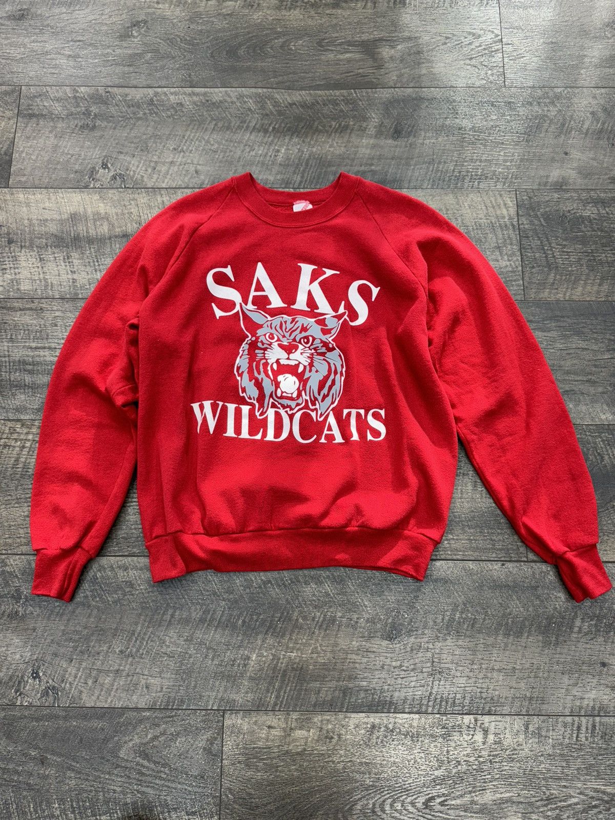 image of Vintage VTG 80’S Saks Wildcats Team Sweatshirt (L) in Red, Men's (Size Large)