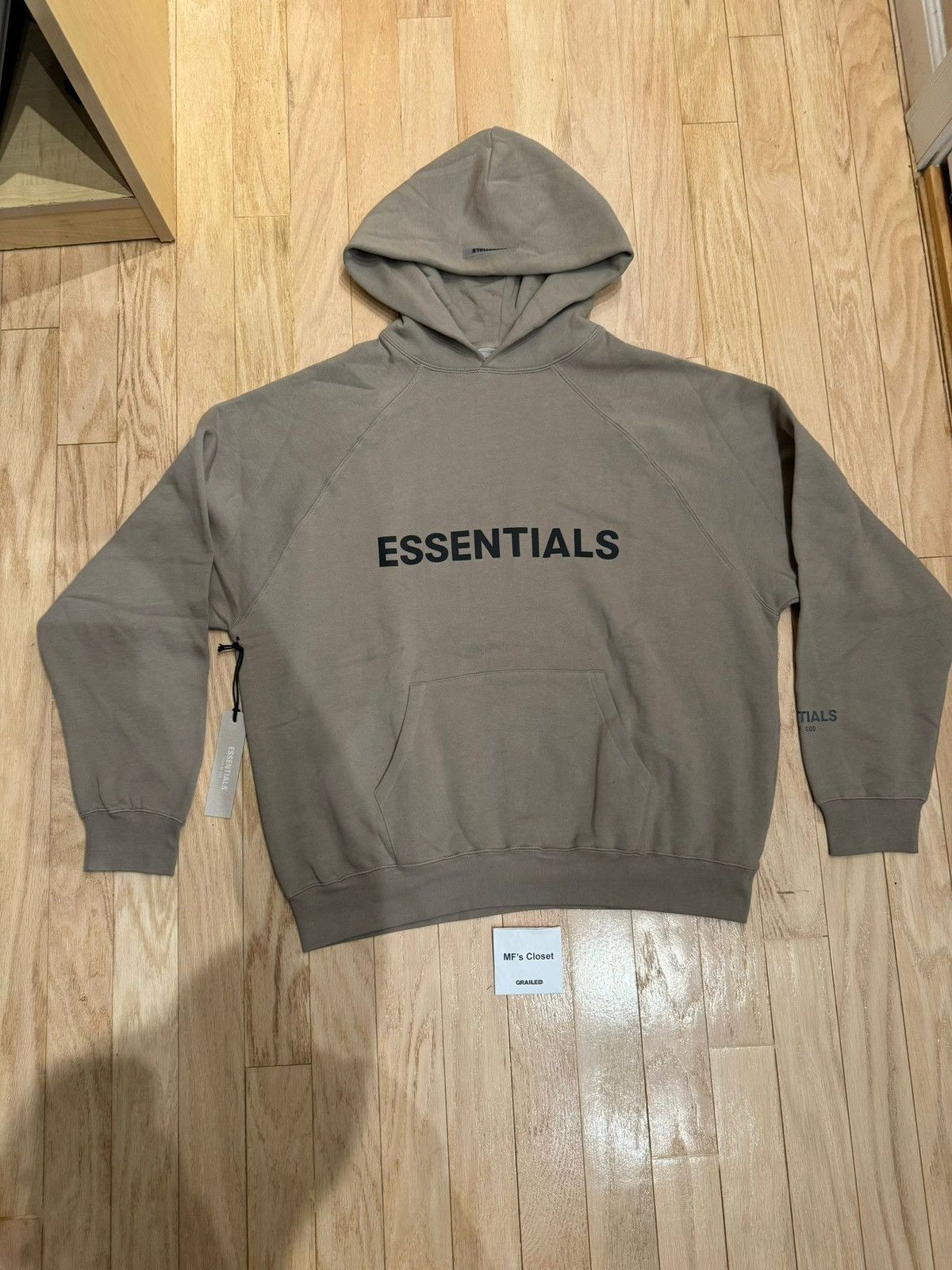 image of Essentials Pullover Hoodie Applique Logo Moss L in Black, Men's (Size Large)