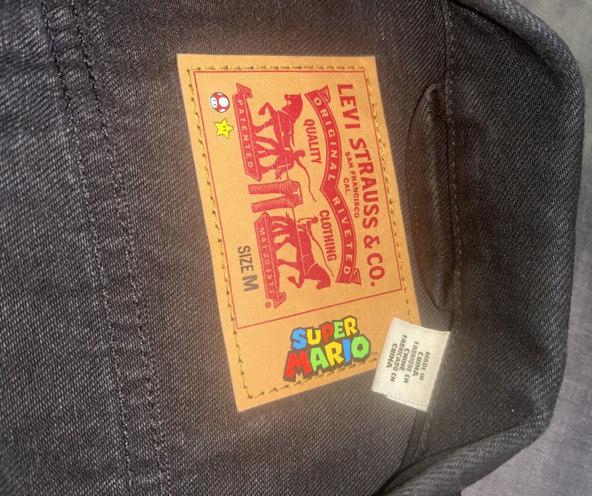 Levi's Levi's x Super Mario Black Denim Trucker Jacket (Sz-Medium) Size US M / EU 48-50 / 2 - 3 Thumbnail
