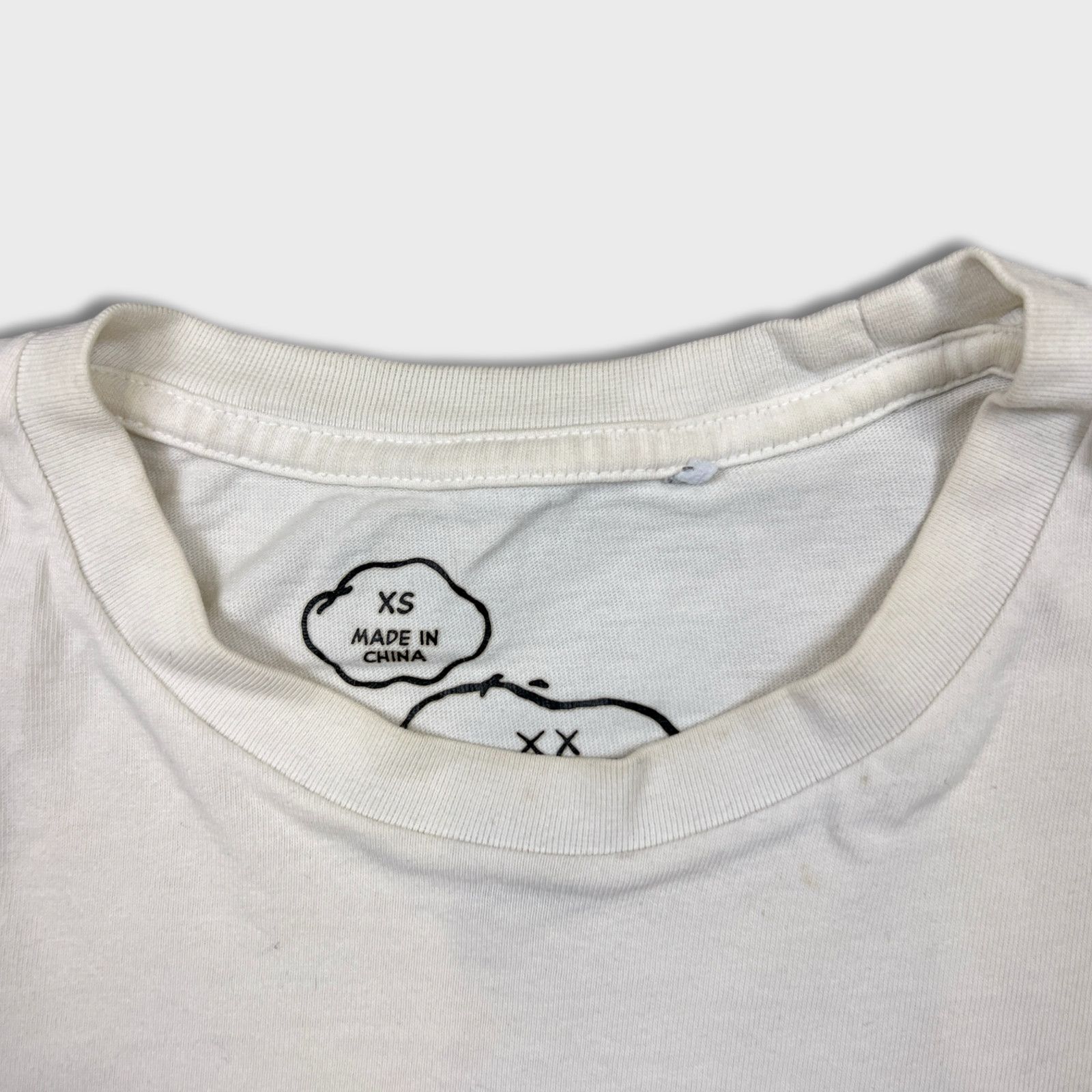 Kaws × Uniqlo KAWS Uniqlo Peanuts Snoopy Pocket Tee Short Sleeve T Shirt Size US XS / EU 42 / 0 - 5 Thumbnail