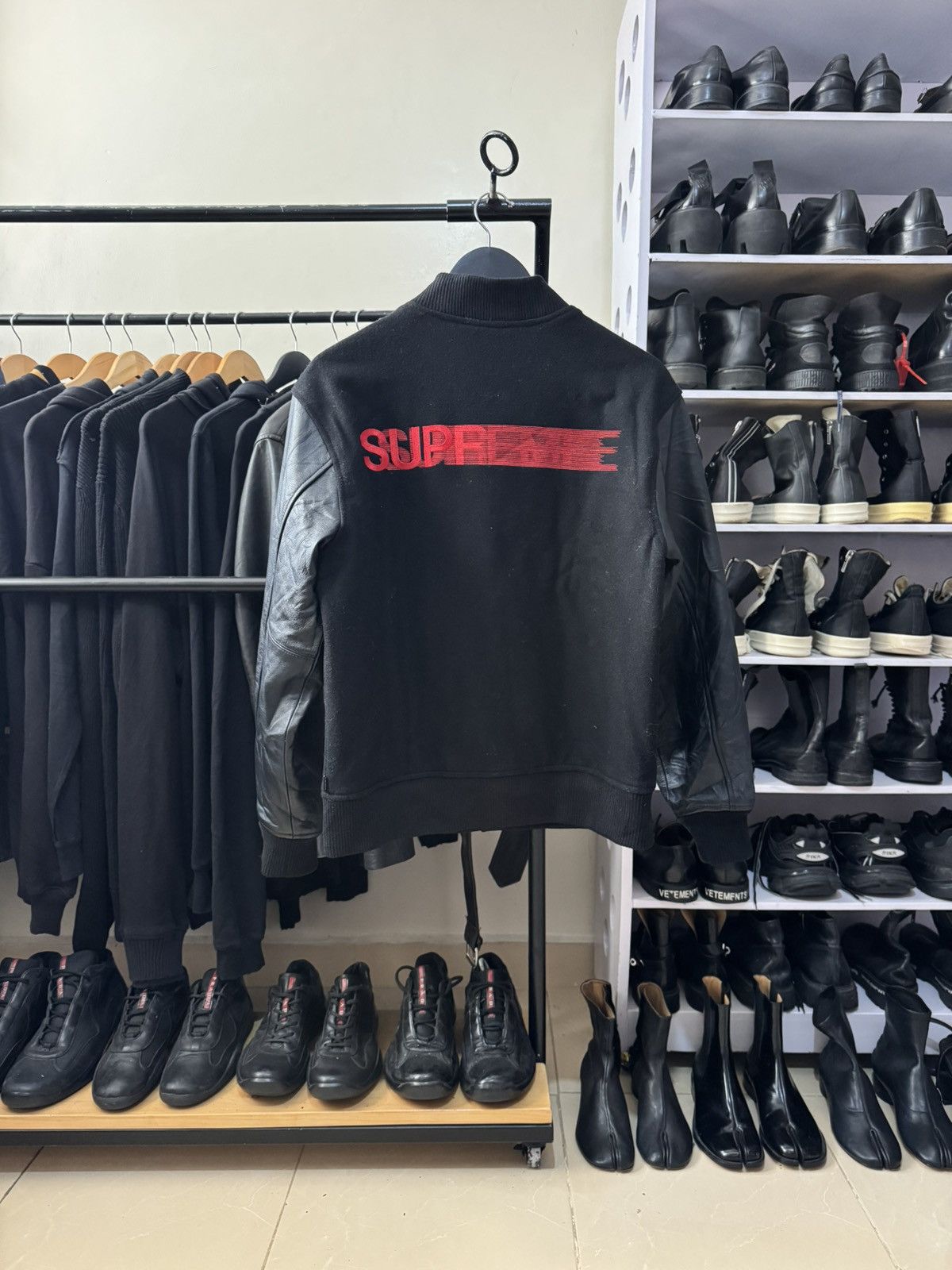Supreme logo motion varsity jacket