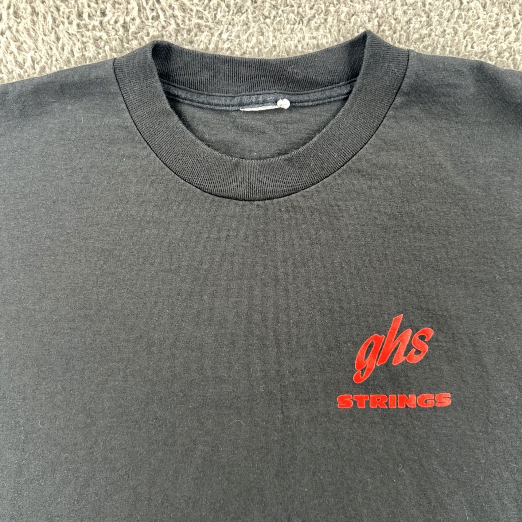 Vintage VINTAGE GHS STRINGS Boomers Guitar And Bass Strings Mens Large Black T Shirt 90s Size US L / EU 52-54 / 3 - 6 Thumbnail