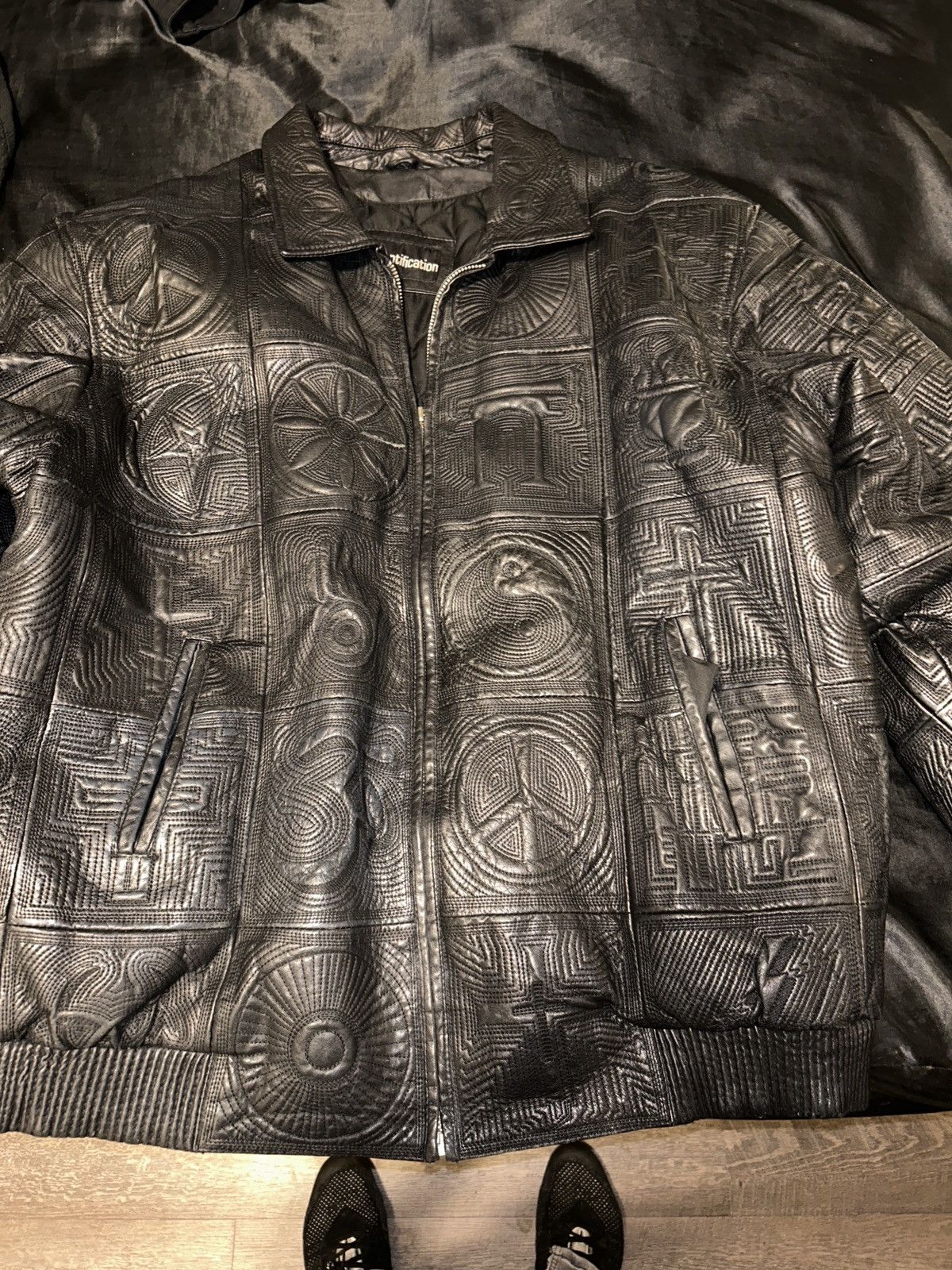 Identification World peace leather jacket