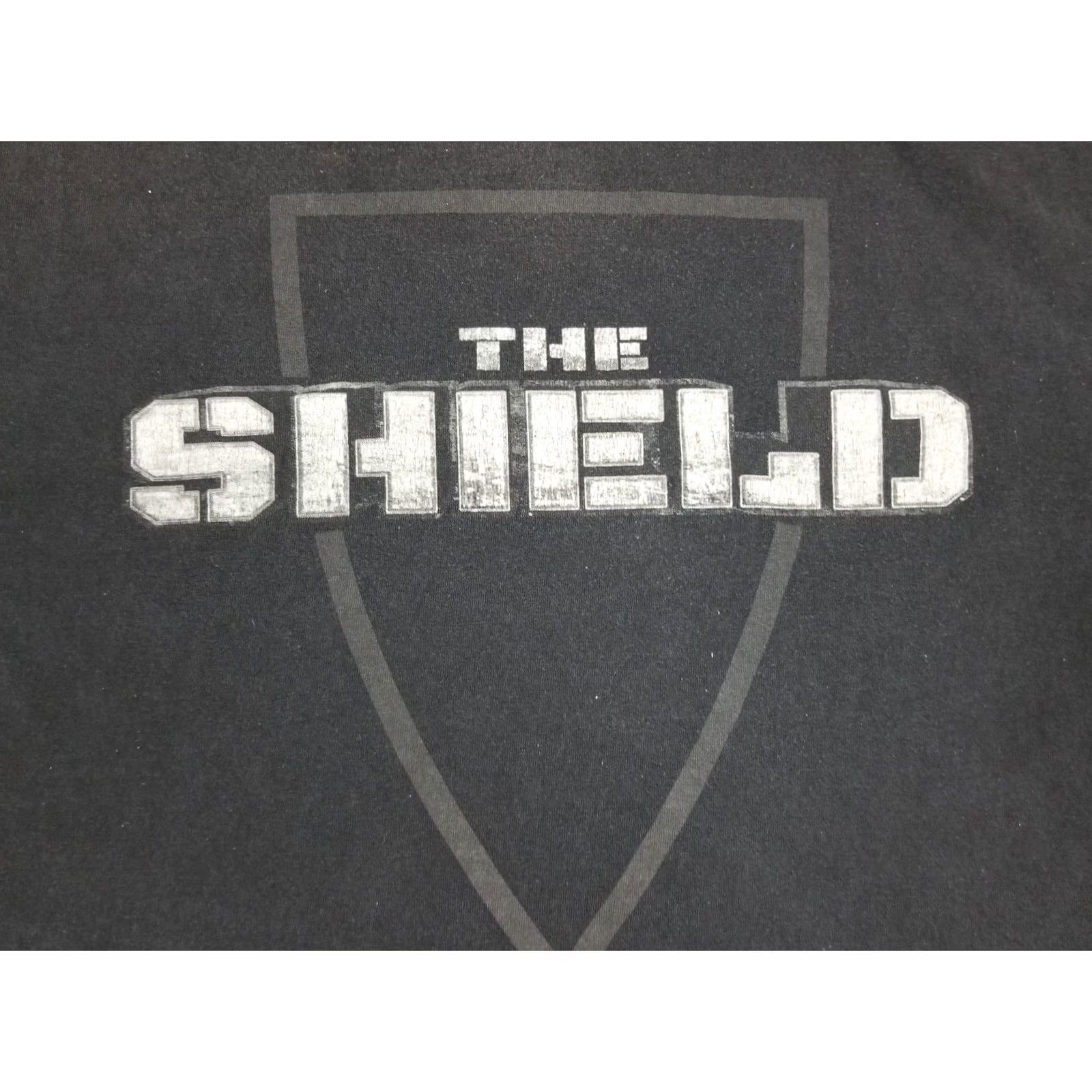 Vintage VINTAGE WWE THE SHIELD T-SHIRT Cotton Black XLARGE Mens Short Sleeve Round Neck 23 INCH Chest 28 INCH Back Length Size US XL / EU 56 / 4 - 2 Thumbnail