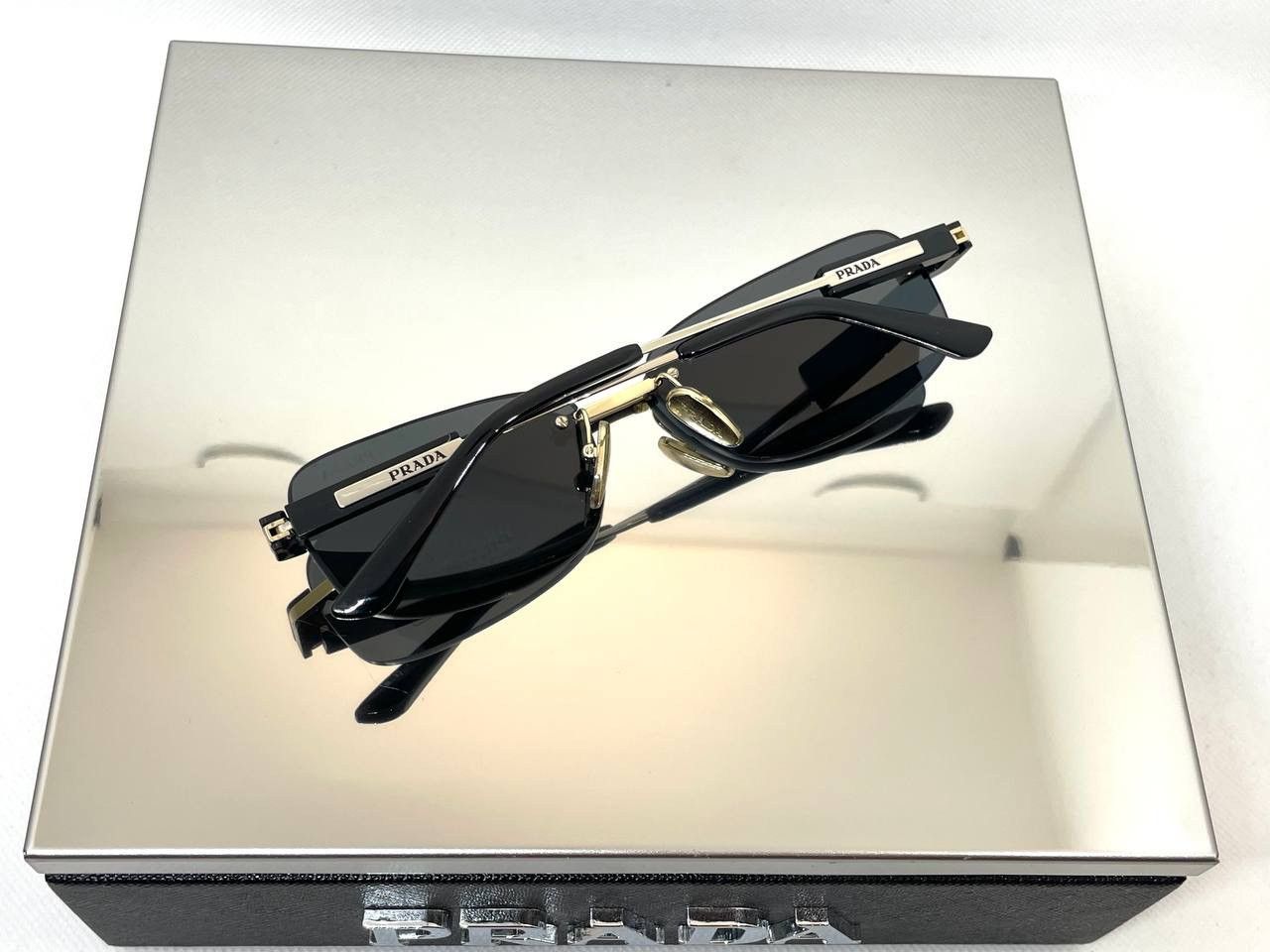 Prada Prada Sunglasses with iconic metal plaque PR68ZS ZVN09T Size ONE SIZE - 4 Thumbnail