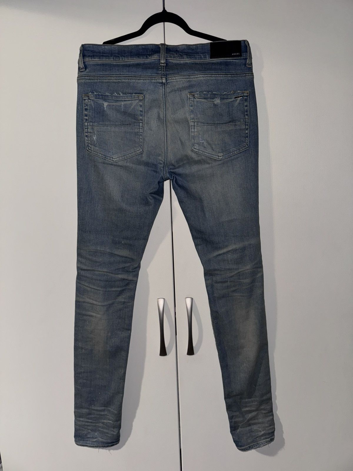 AMIRI BLUE DISTRESSED JEANS