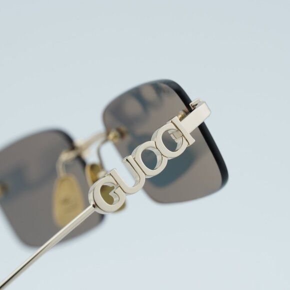 Gucci Gucci GG1808S 003 Sunglasses Gold Rectangle Frame, Grey Size ONE SIZE - 8 Thumbnail