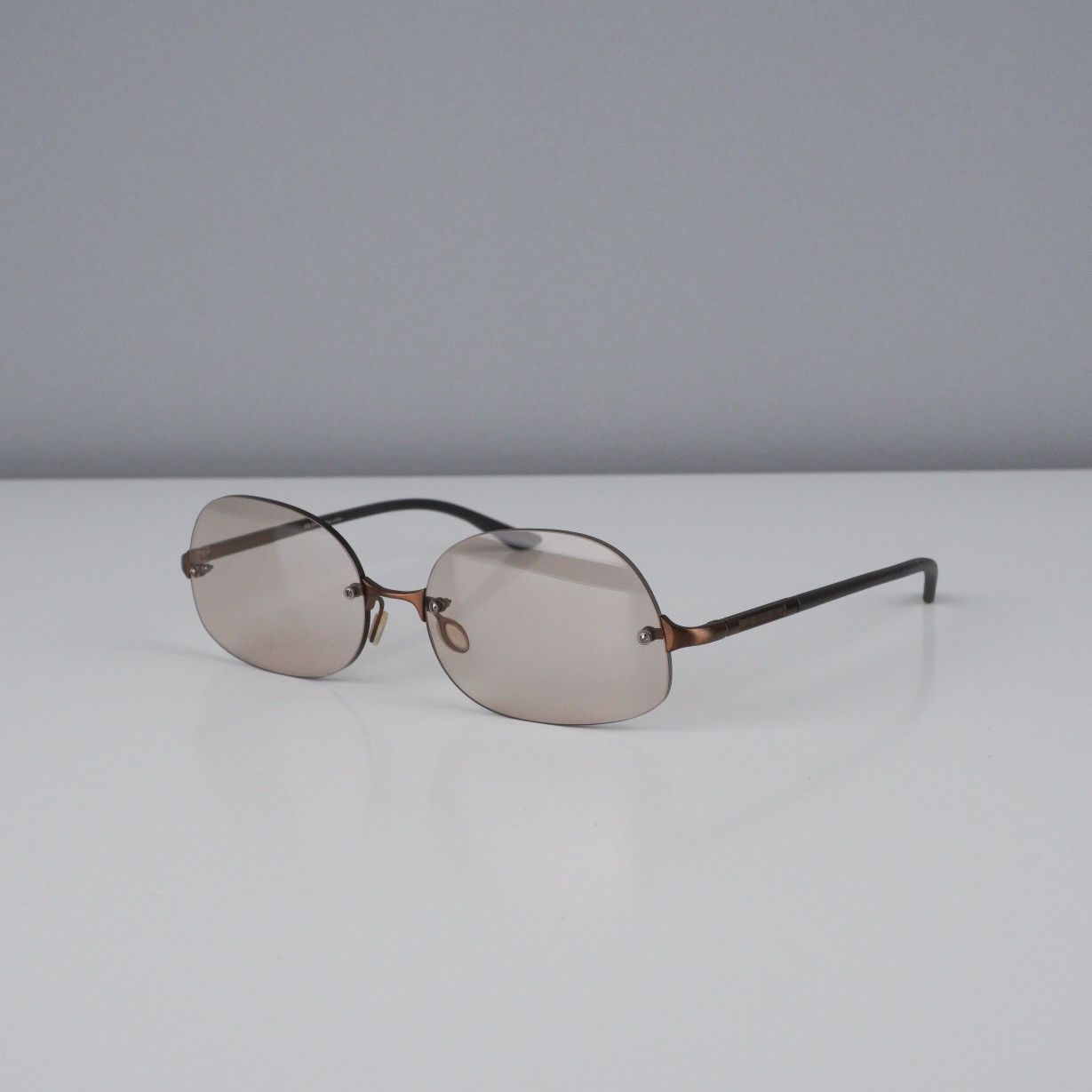 image of Vintage Prada Logo Bronze Brown Rimless Oval Sunglasses, Men's