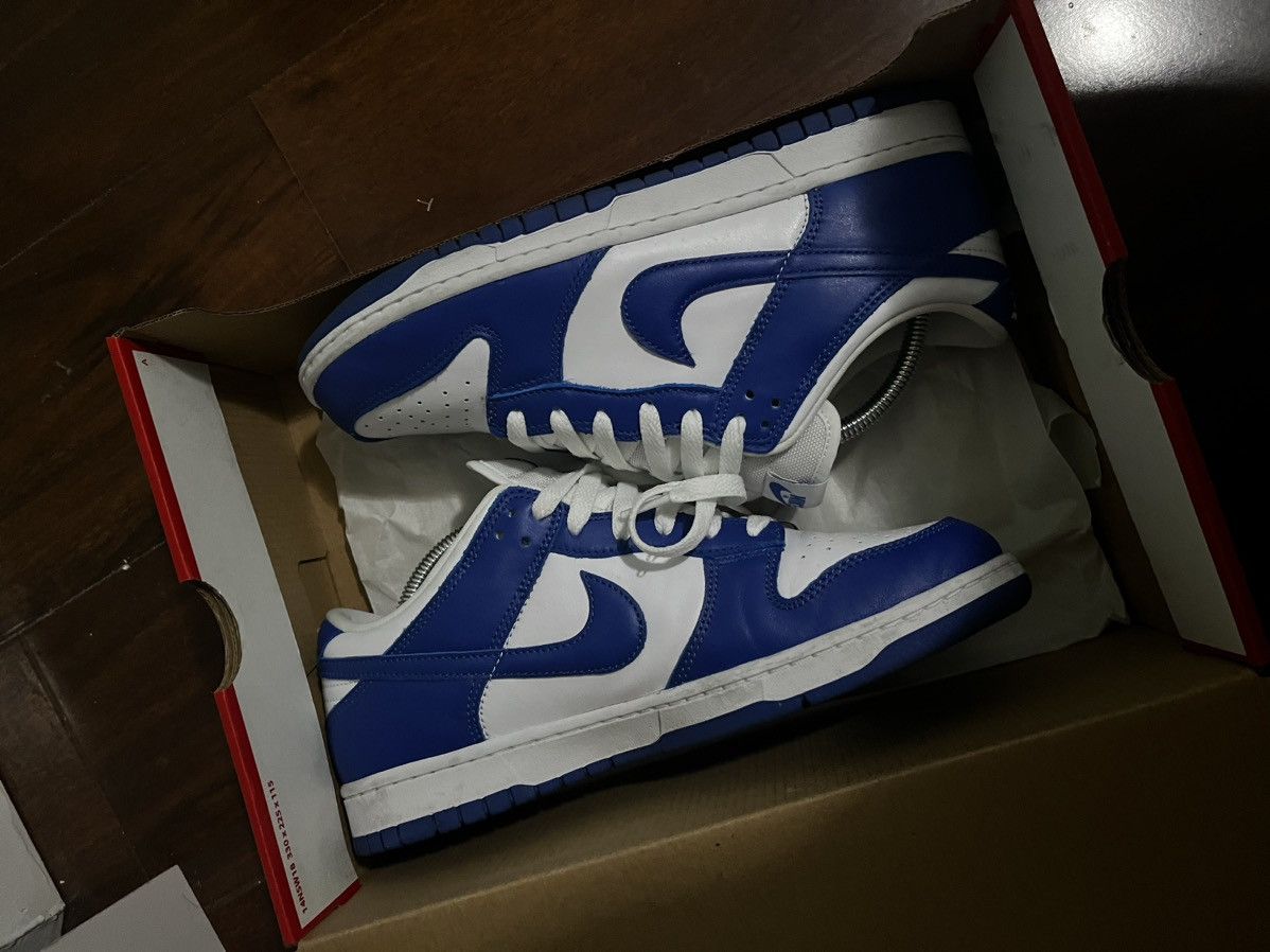 image of Nike Dunk Low Kentucky Shoes in Blue, Men's (Size 8.5)