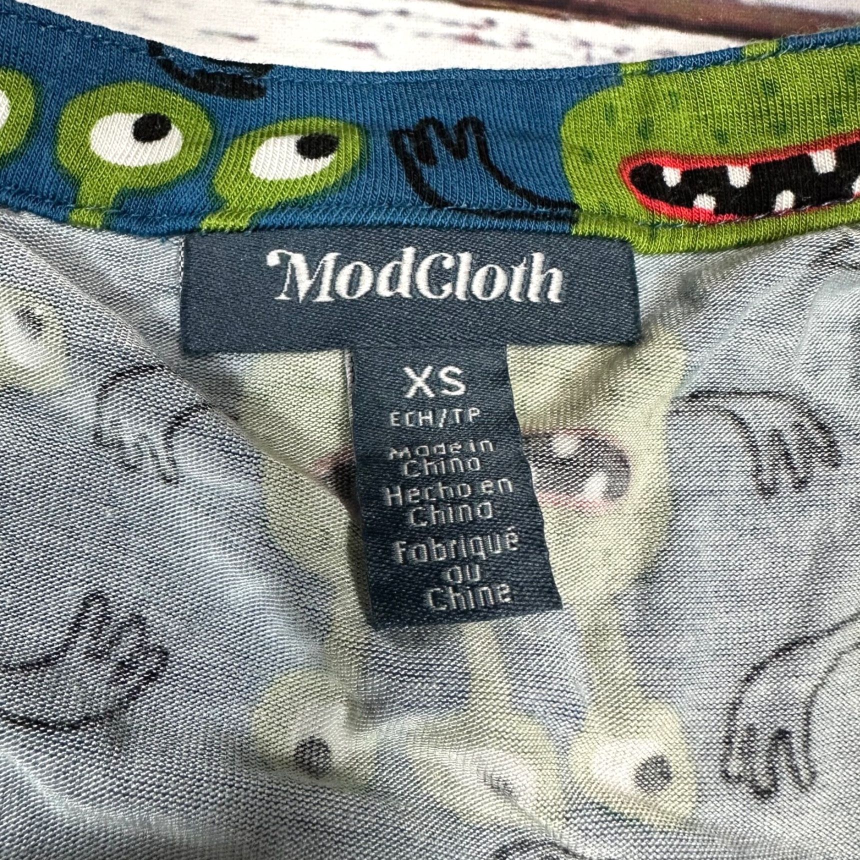 Vintage ModCloth A Welcome Change Sleeveless Tank XS Blue Green 3 Eyed Monster Print Tank Womens XS Blue 3 Eyed Monster Print Size XS / US 0-2 / IT 36-38 - 4 Thumbnail