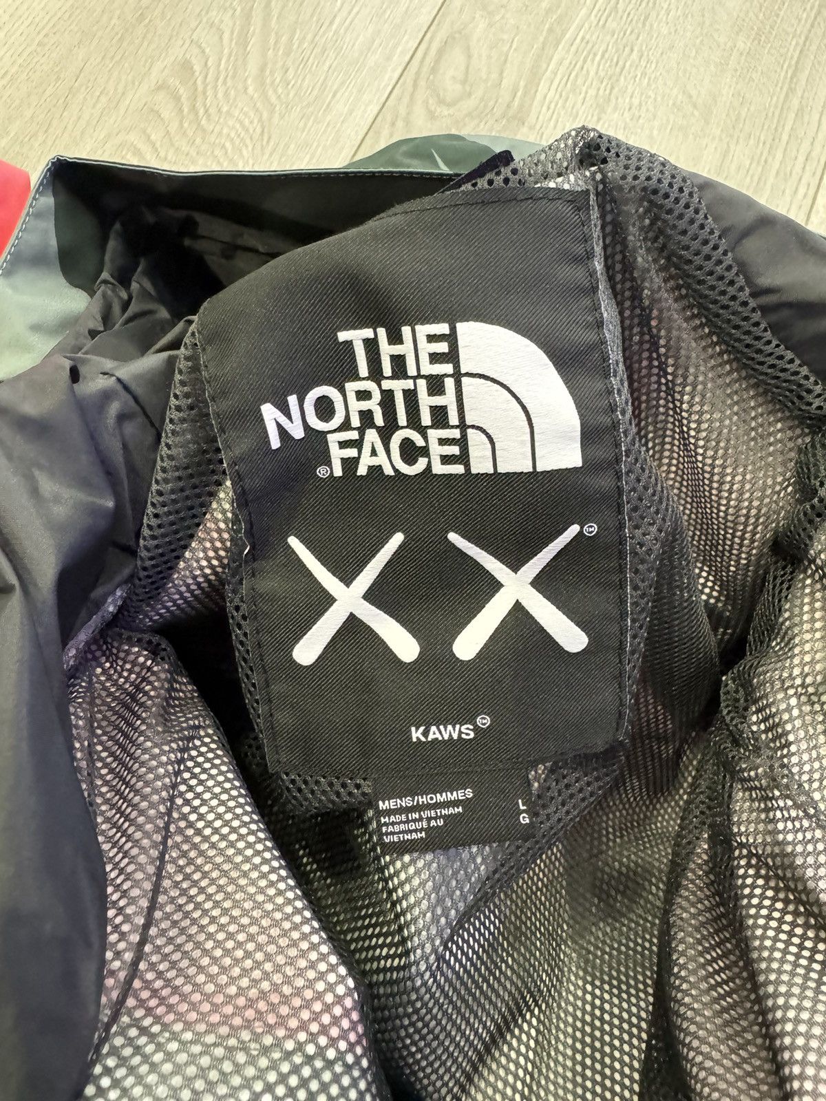 Kaws × The North Face KAWS X THE NORTH FACE 1986 MOUNTAIN JACKET BALSAM GREEN Size US L / EU 52-54 / 3 - 10 Thumbnail