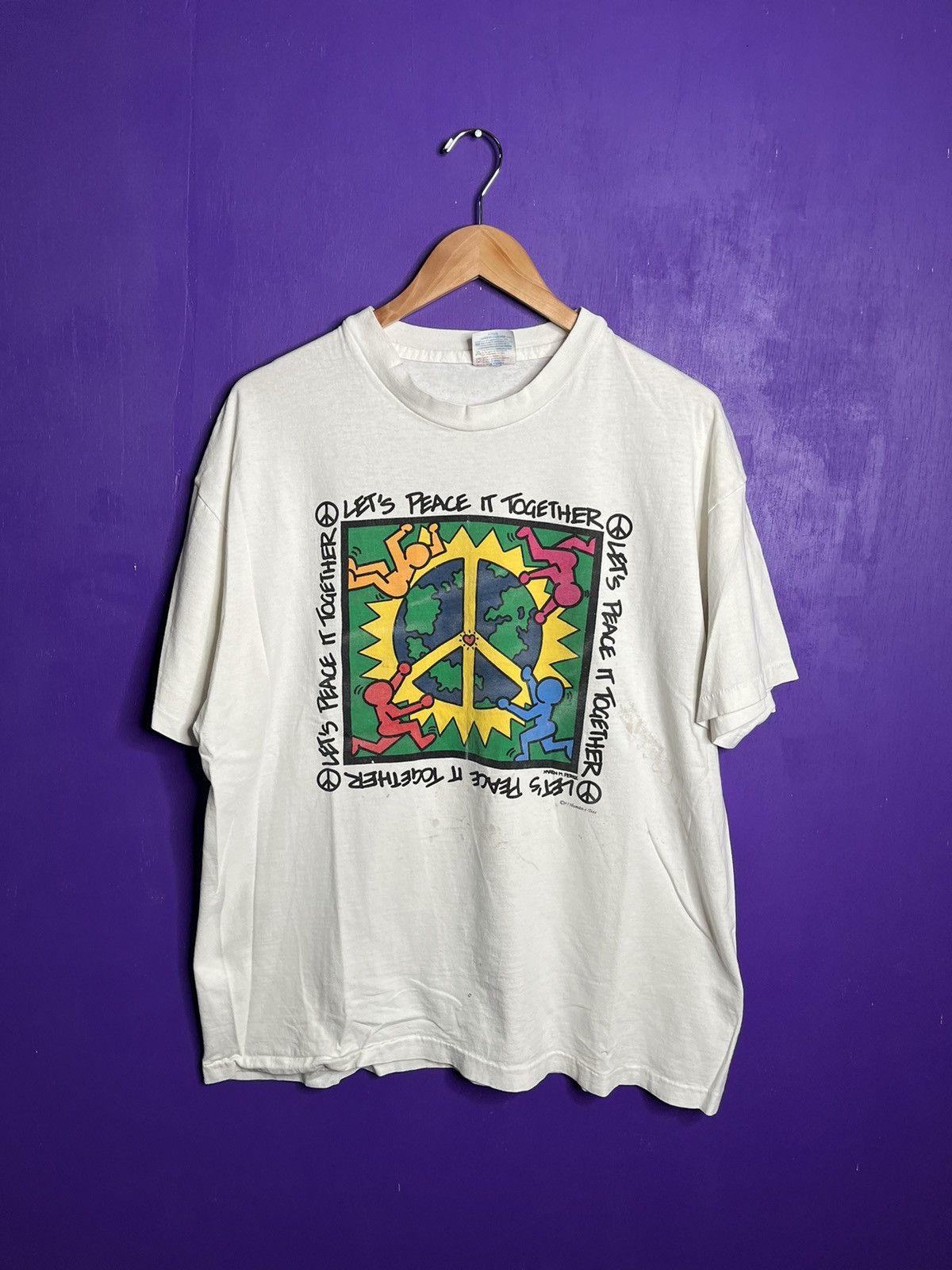 Vintage 90s Keith Haring style lets piece it together tee