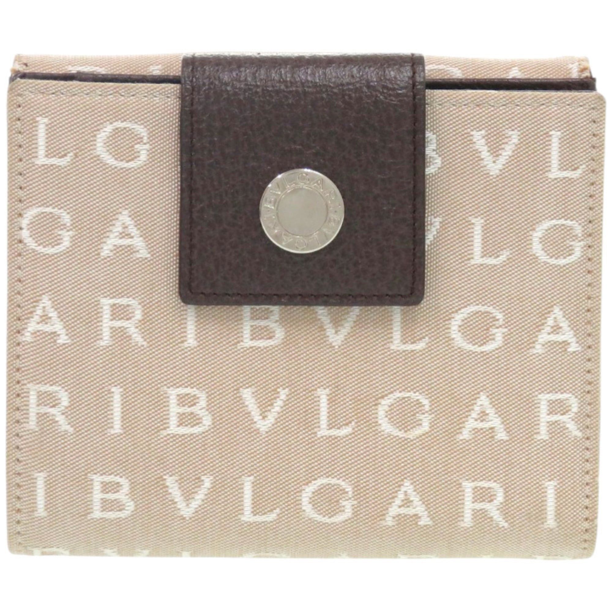 Bvlgari Like new Bvlgari Logomania canvas and leather bifold wallet with silver hardware, beige, 0445. Size ONE SIZE - 1 Thumbnail