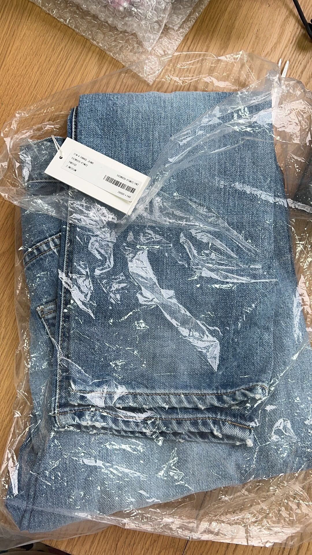 Damage Jeans with Rips and Distressing