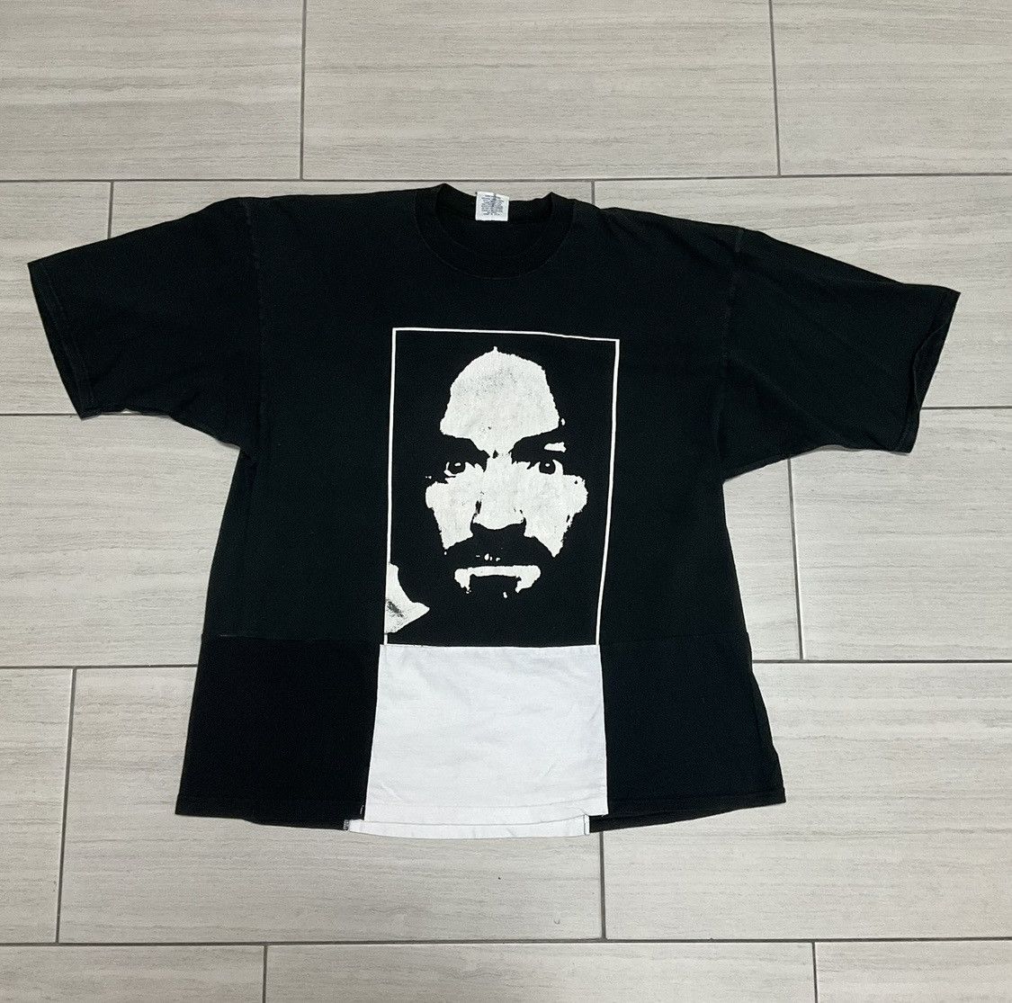 image of American Classics x Vintage Charles Manson Charlie Don’T Surf in Black, Men's (Size 2XL)