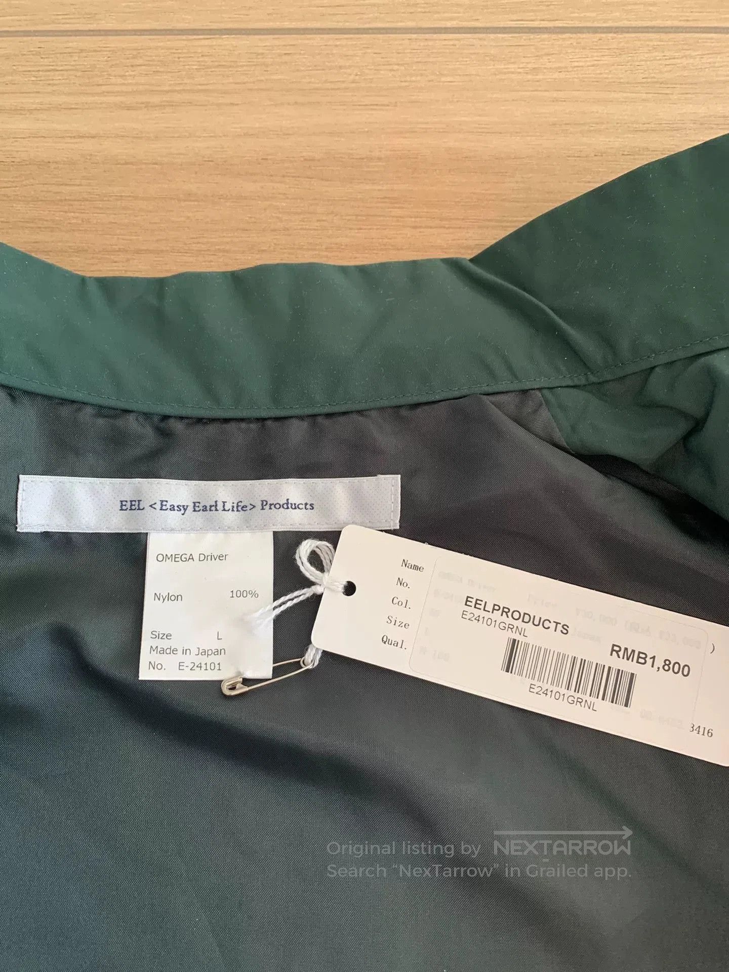 UNIVERSAL PRODUCTS. green windbreaker with zip front and collar. Size US L / EU 52-54 / 3 - 4 Thumbnail