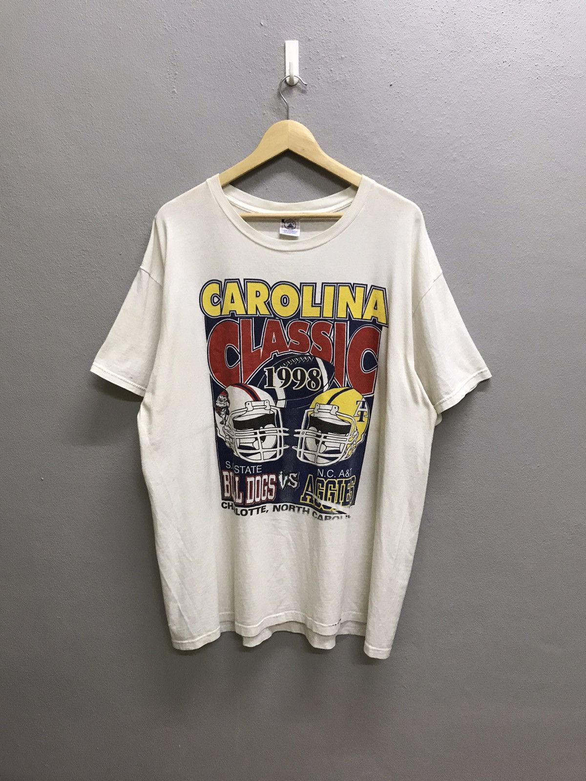 NFL VINTAGE 90s NFLP CAROLINA CLASSIC BULLDOG VS AGGIES TSHIRT Size US XL / EU 56 / 4 - 3 Thumbnail