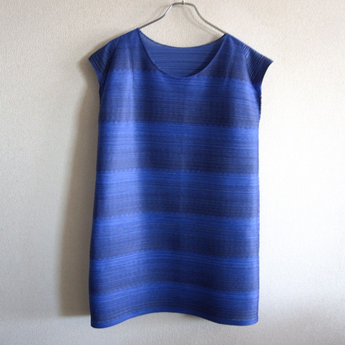 horizontal pleated dress How To Wear a Pleated Dress for Any Occasion