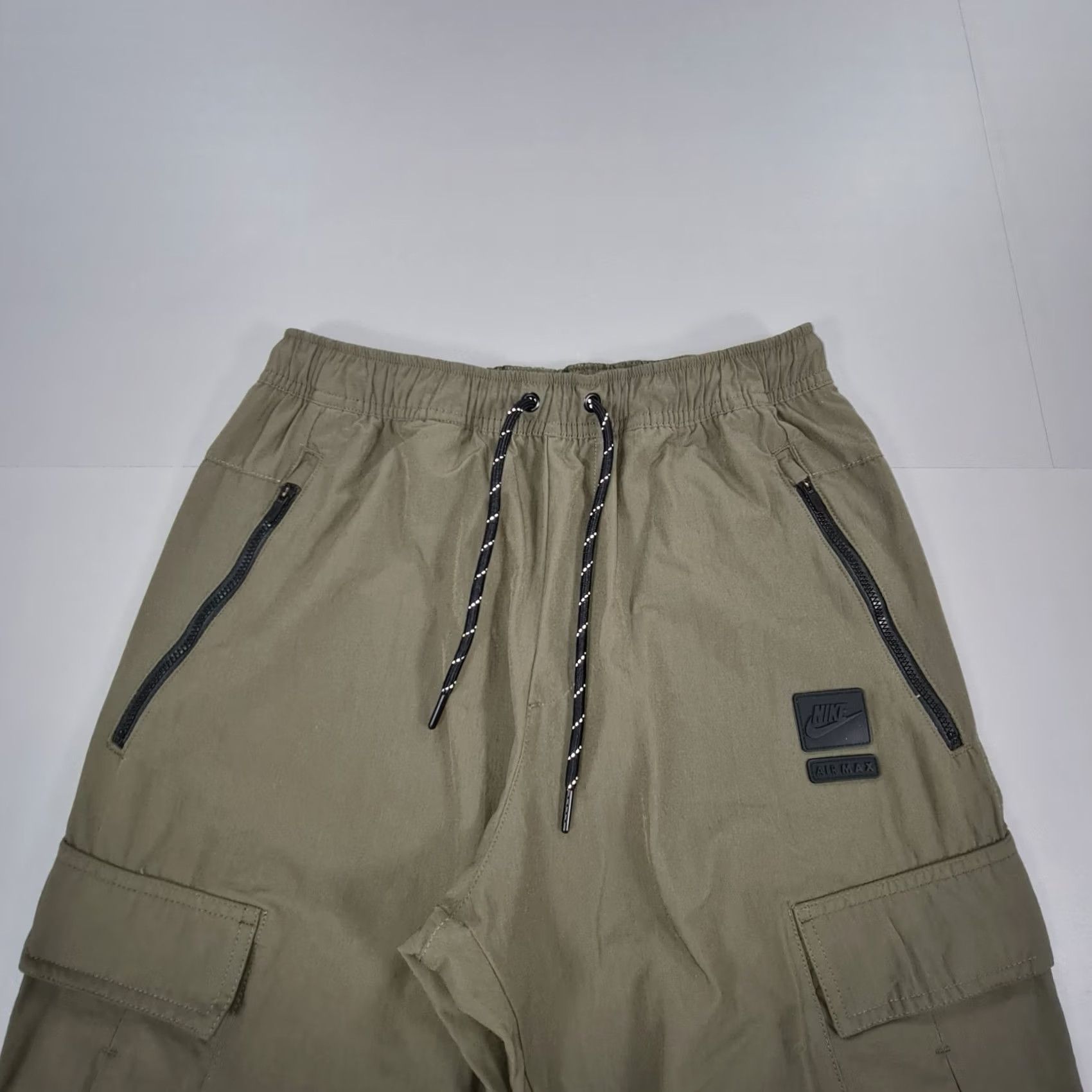 Nike Nike Air Max Cargo Pants Mens Small Green Woven Joggers BV4923 325 Elastic Waist Pockets Zip Pocket Exercise Athletic Shirt? Size US 29 - 2 Thumbnail