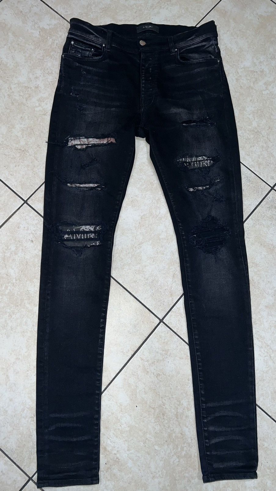 Pre-owned Amiri Jeans Hibiscus Art Patch In Black