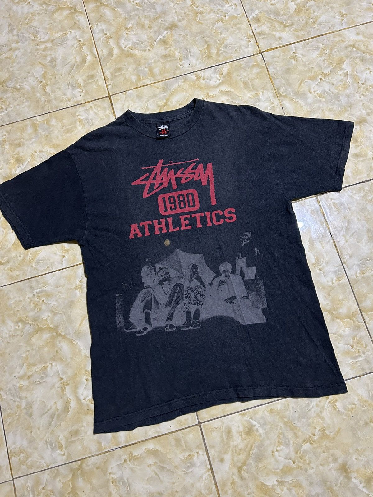 image of Stussy 1980 Athletics Graphic Tee in Faded Black, Men's (Size Medium)