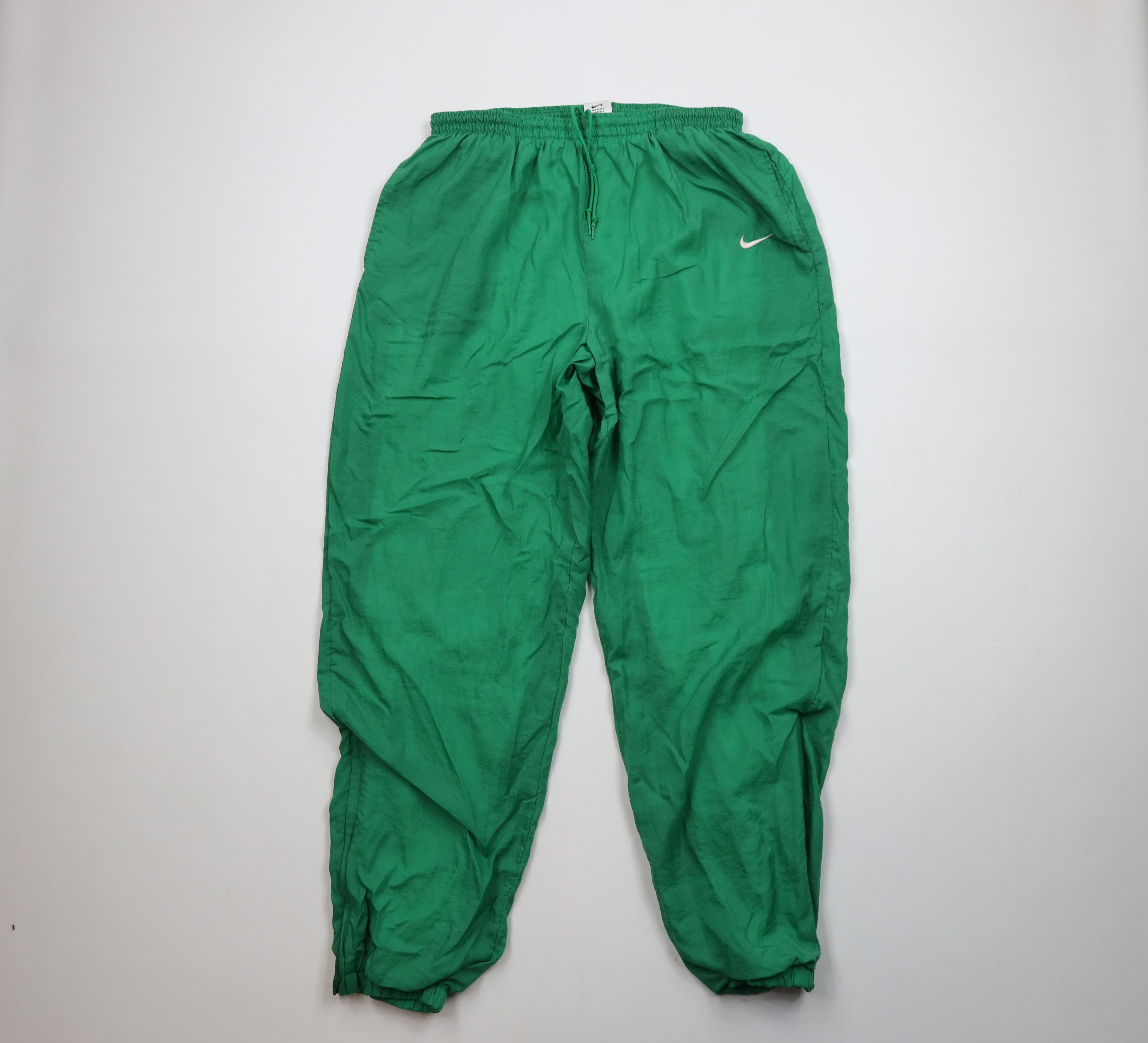 パンツ 90s old NIKE nylon wide pant dark green vintage 90s NIKE TRACK Nylon sweatpants Brand: | Depop