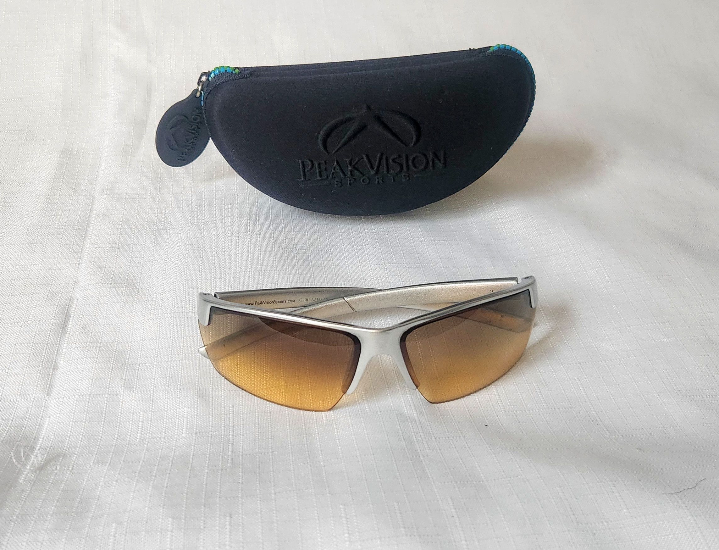 peak vision sports sunglasses with case not sure of name