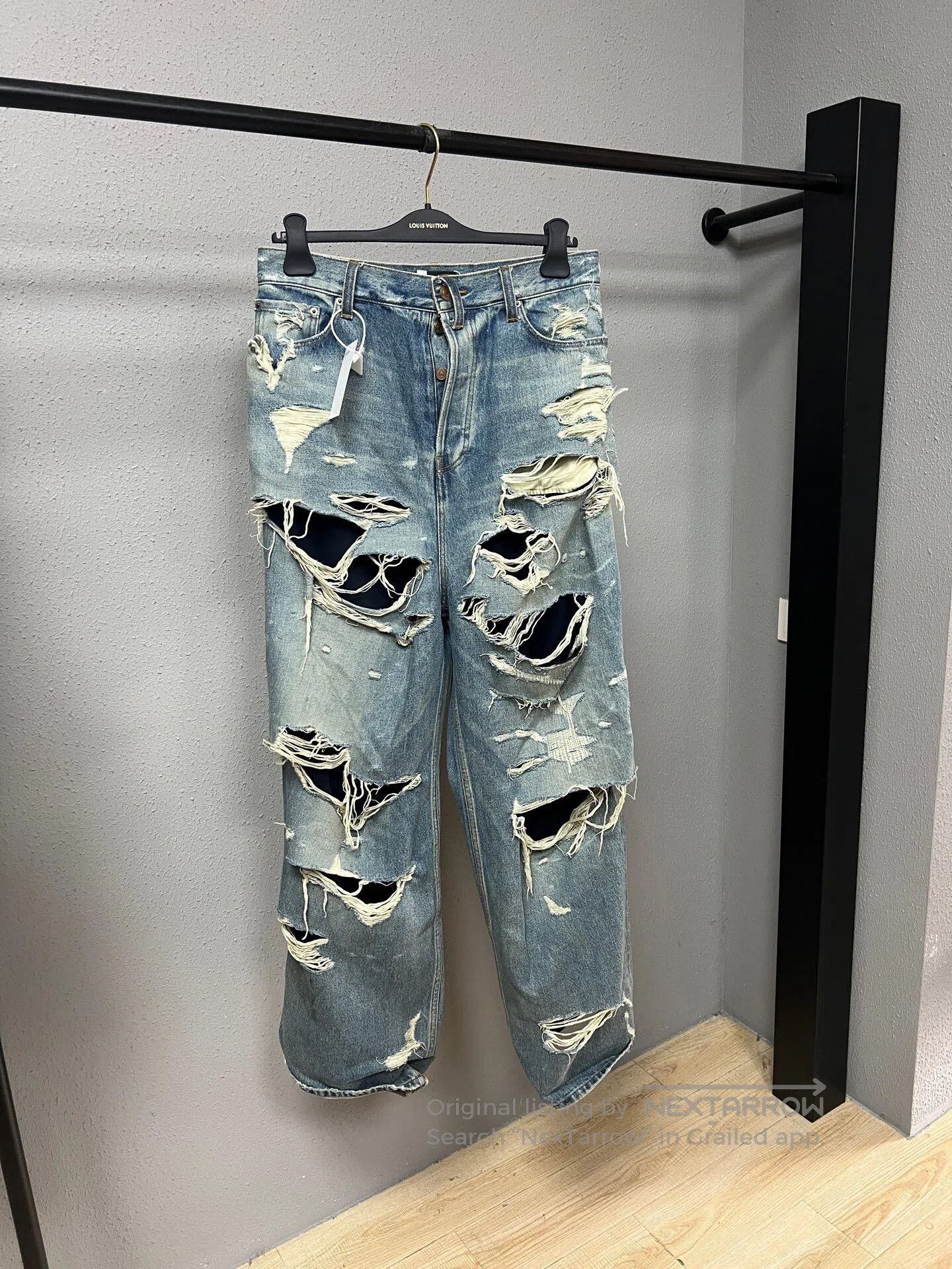 balenciaga dual-layer distressed denim pants.