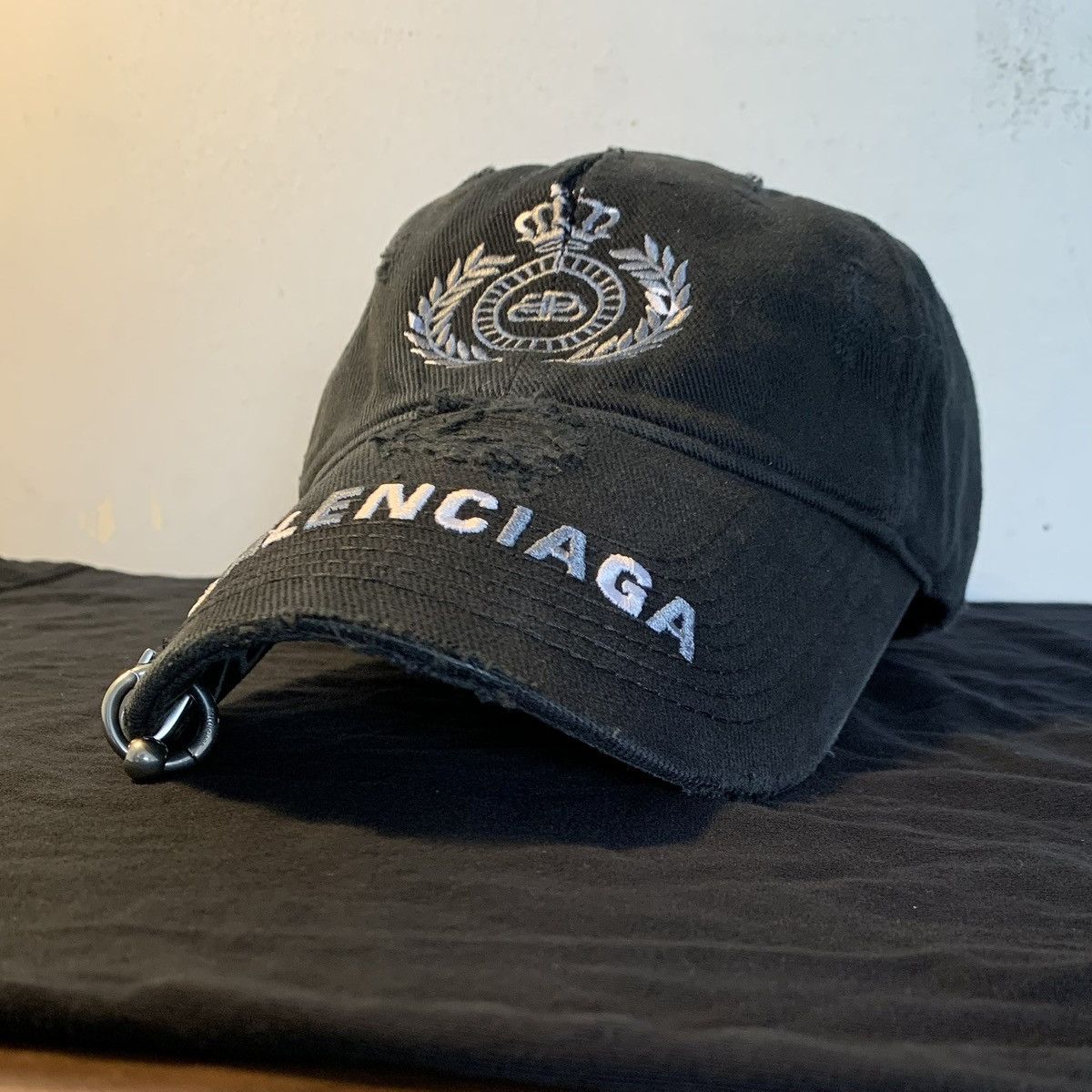 Balenciaga Balenciaga Destroyed Piercing Cap | Grailed