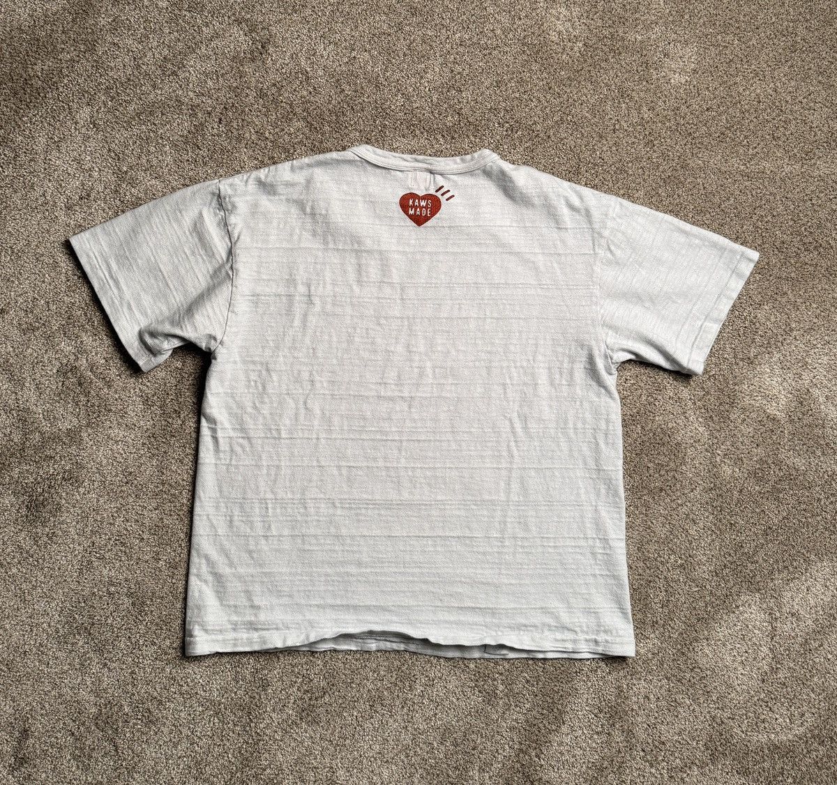 Human Made × Kaws HUMAN MADE X KAWS “DRY ALLS” SLUB GRAPHIC TEE Size US L / EU 52-54 / 3 - 5 Thumbnail