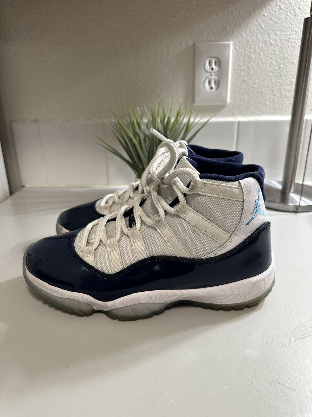 image of Jordan Brand 11 Win Like 82 Shoes in White, Men's