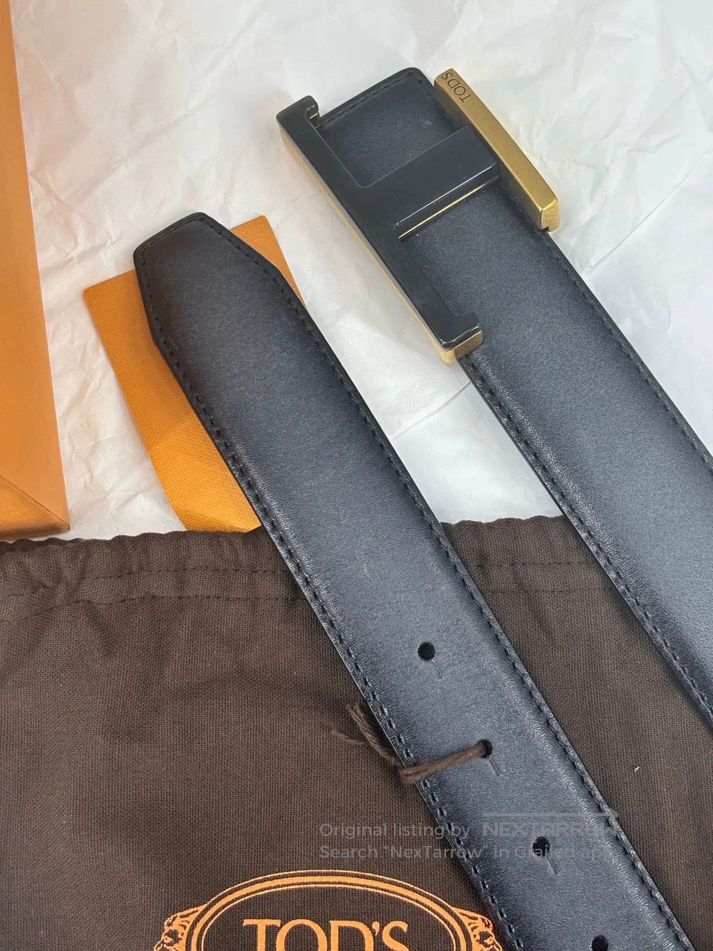 Tod's Black Leather Belt with Gold Logo.