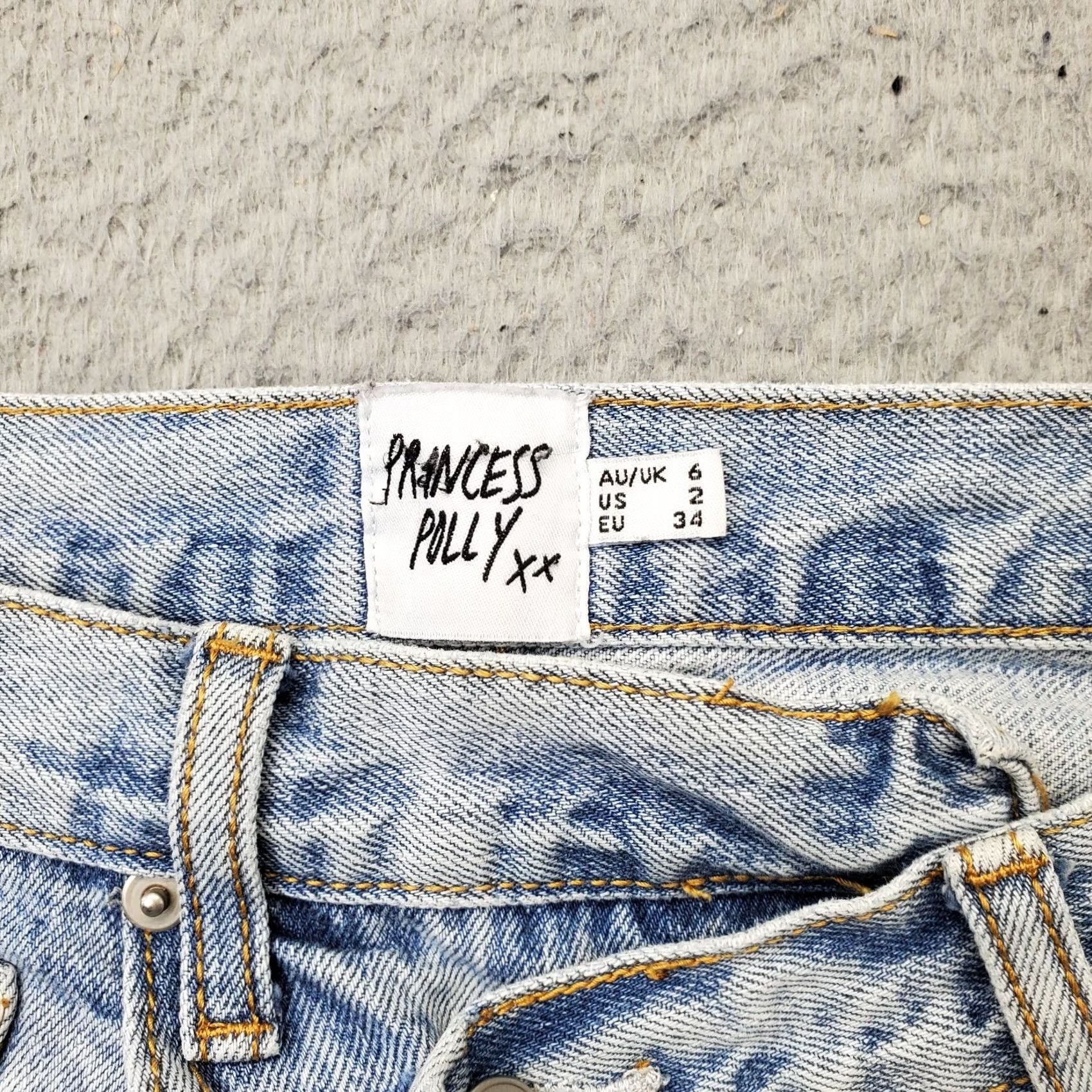 PRINCESS POLLY Princess Polly XX Asymmetric Jeans Womens 2 Blue Denim Straight Leg Button Fly Jeans Womens Size 2 Blue Denim 5-Pocket Design Regular Fit Mens? Womens Size 26" / US 2 / IT 38 - 7 Thumbnail