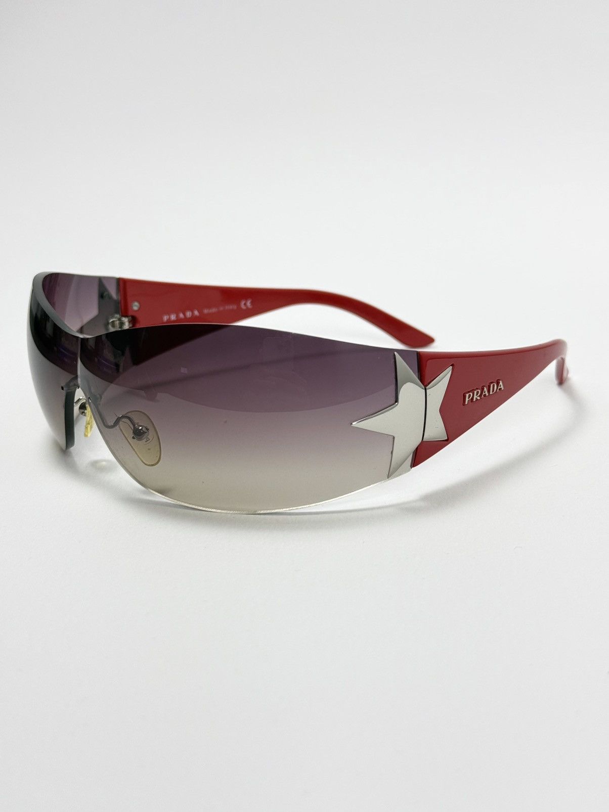 Prada Vintage Prada Y2K SPR 72G Star Sunglasses | Grailed