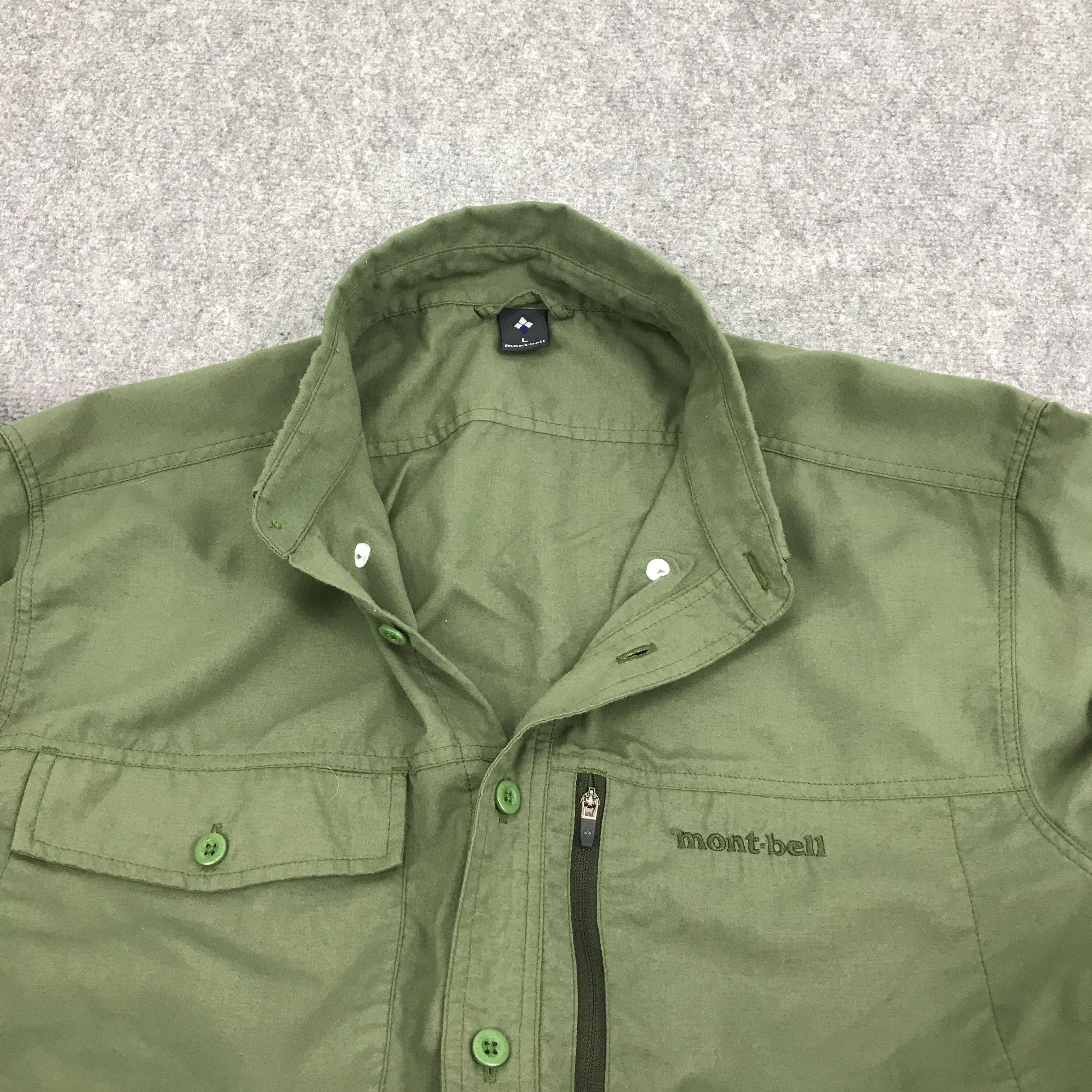 Japanese Brand × Montbell MONT-BELL OUTDOOR GREEN BRAND BUTTON UP TSHIRTS Size US L / EU 52-54 / 3 - 7 Thumbnail