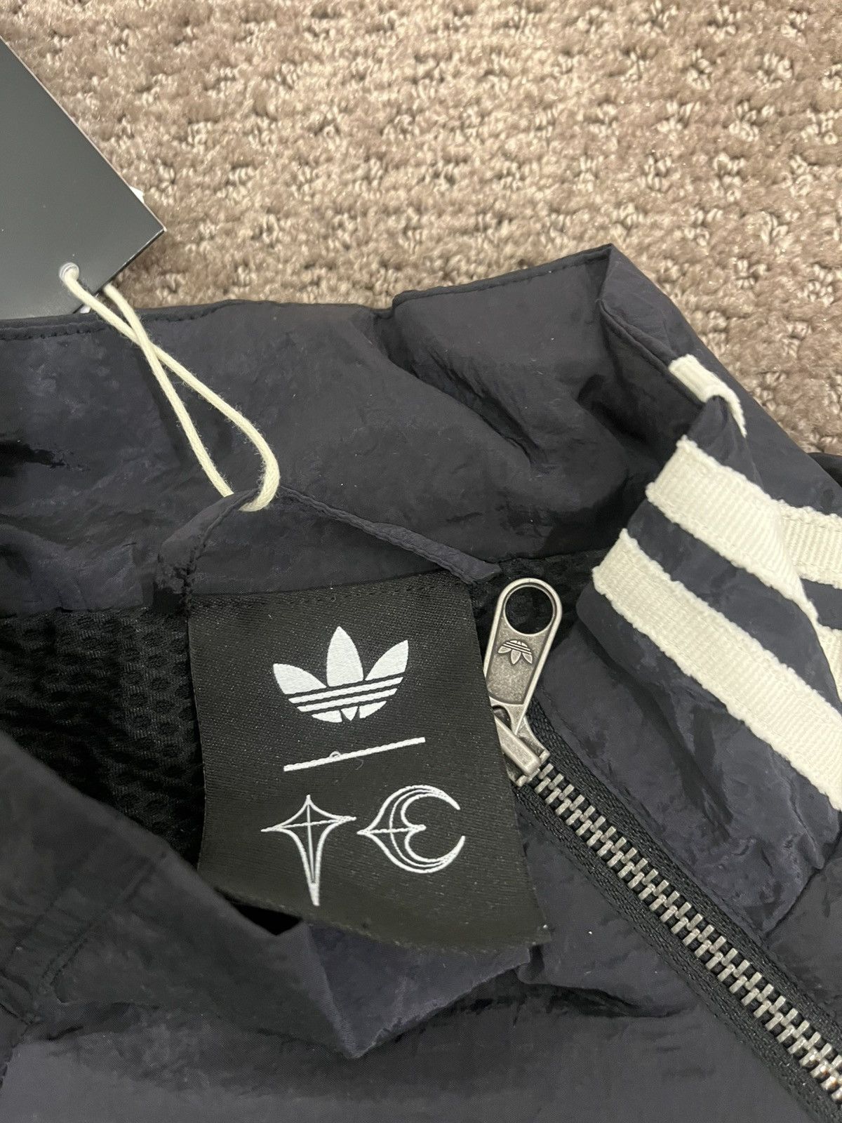 Thug Club Adidas X Thug Club Woven Track Top Black/Silver Brand new Size US L / EU 52-54 / 3 - 5 Thumbnail