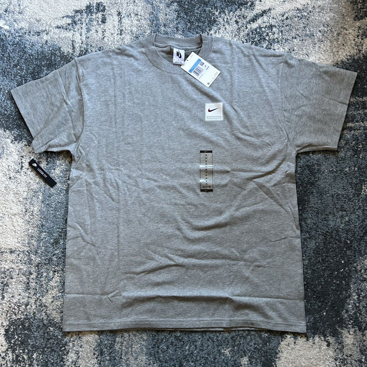 Nike × Pigalle 2019 THE POWER OF SPORT TO MOVE THE WORLD TEE HEATHER SAiL Size US M / EU 48-50 / 2 - 4 Thumbnail