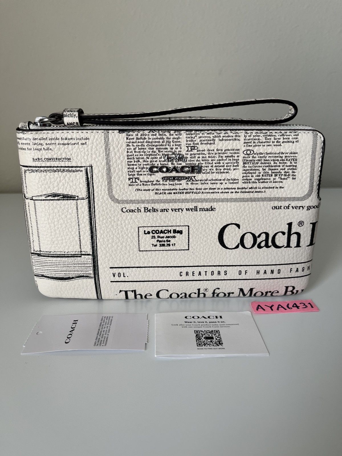 Coach Coach Large Corner Zip Wristlet With Newspaper Print Size ONE SIZE - 1 Thumbnail