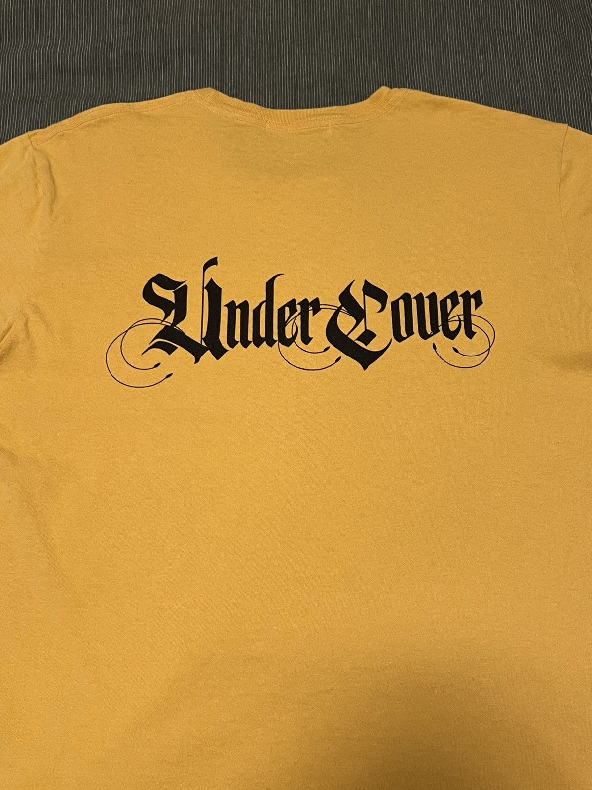 Undercover Undercover old english logo Size US L / EU 52-54 / 3 - 4 Thumbnail