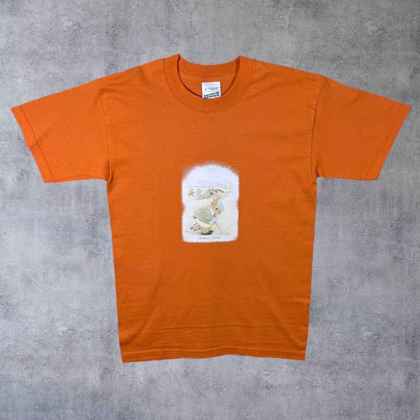 Vintage VINTAGE Screen Stars St. Andrews Scotland Rabbit Golfer Cartoon T-Shirt Mens S Orange Graphic Print 1997 Size US S / EU 44-46 / 1 - 2 Thumbnail